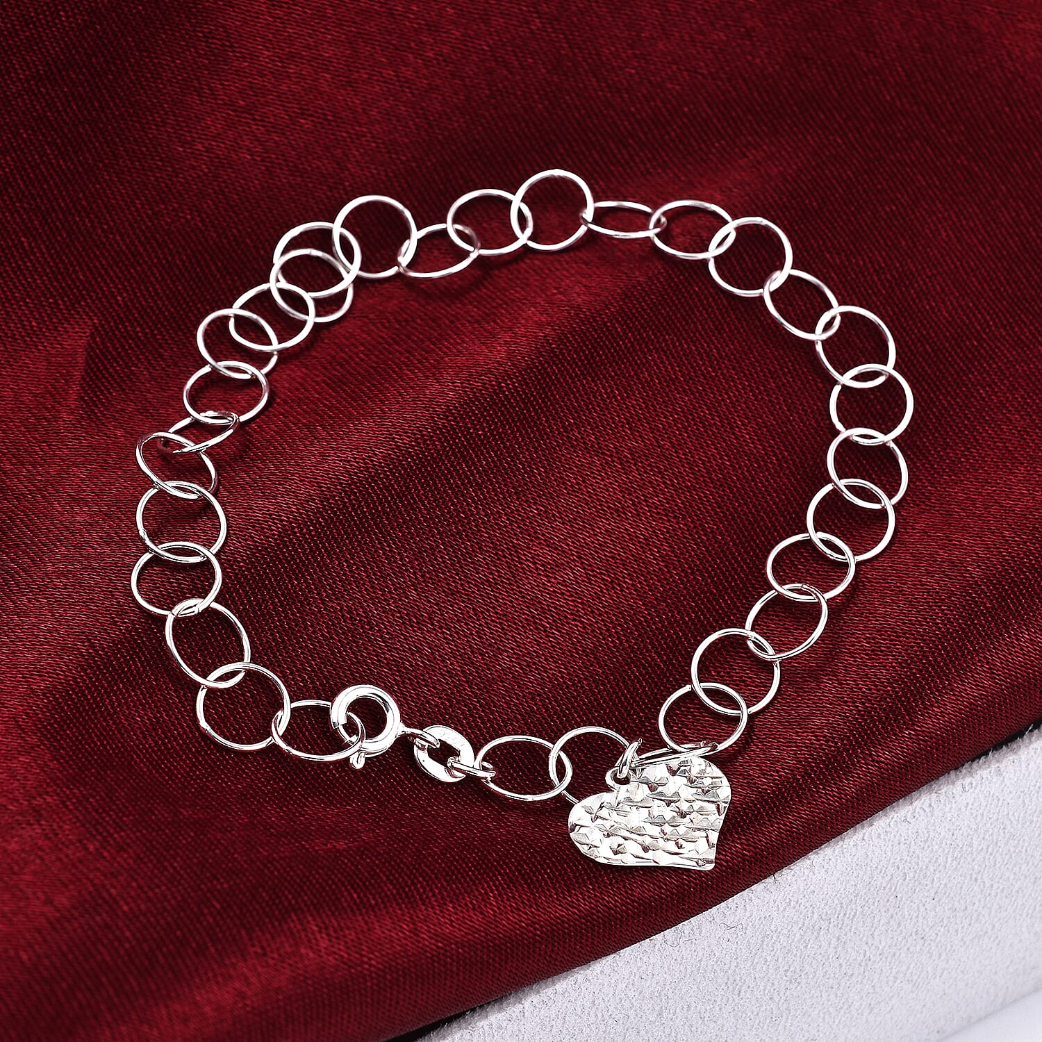 New York Close Out Sterling Silver Round Link Heart Charms Bracelet (Size 7.5) with Spring Ring Clasp.