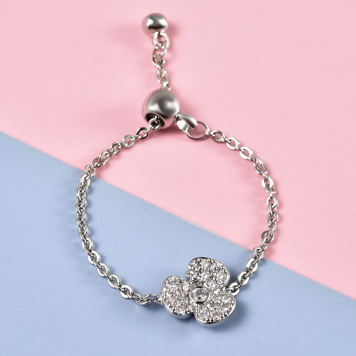 Simulated Diamond Floral Adjustable (Size I-U ) Bolo Ring in Silver Tone