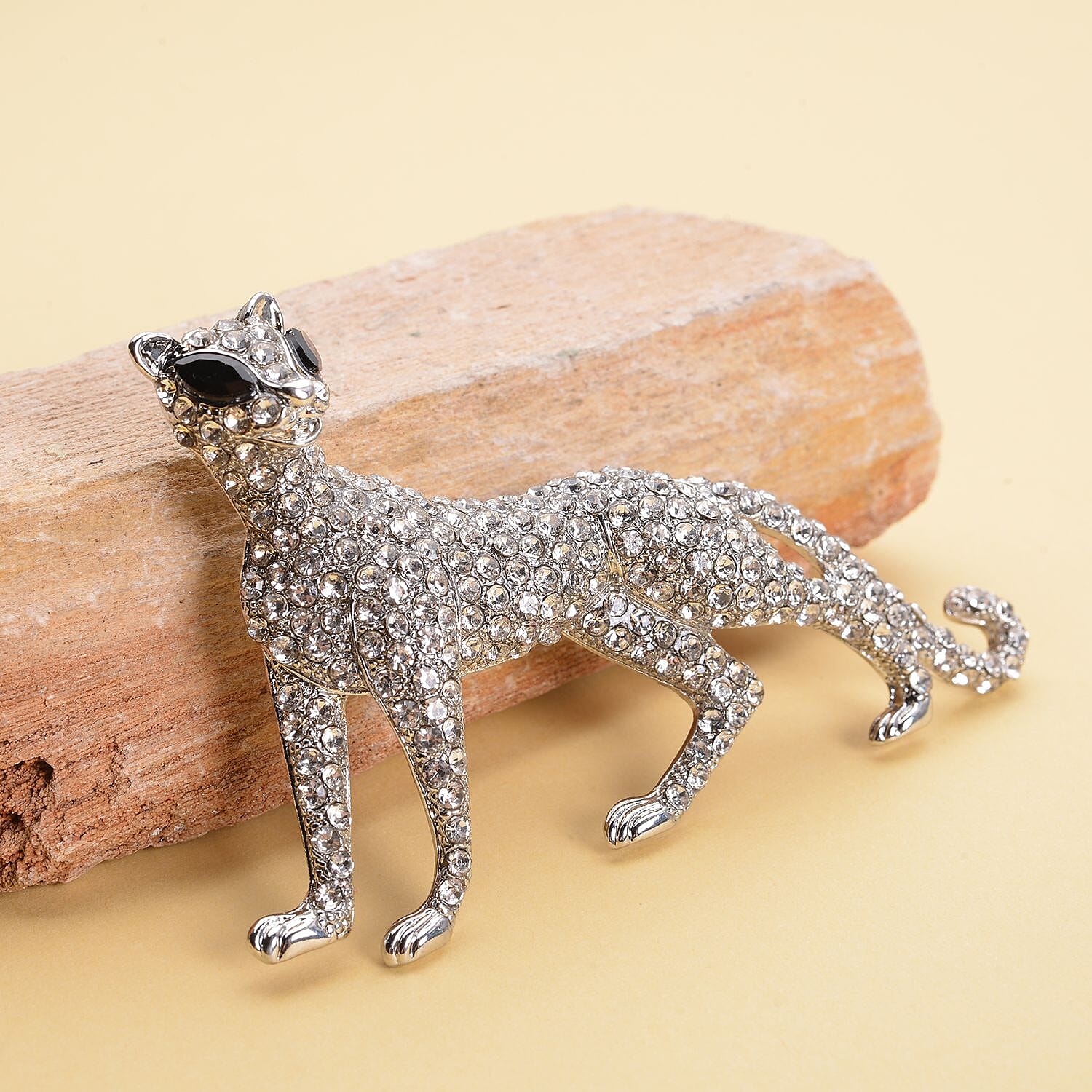 White Austrian Crystal and Simulated Black Spinel Panther Brooch in Silver Tone