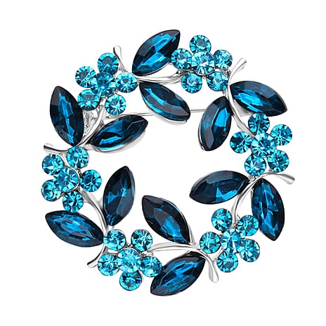 Blue Austrian Crystal and Simulated Apatite Wreath Embellished Brooch in Silver Tone