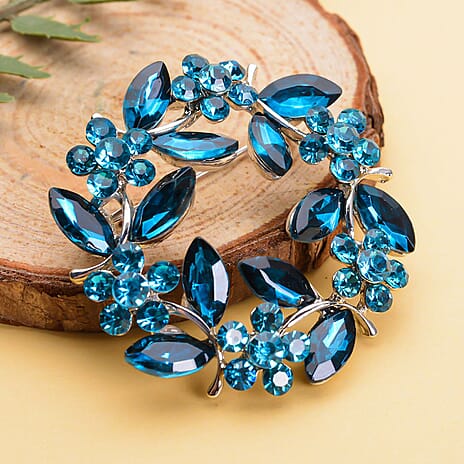 Blue Austrian Crystal and Simulated Apatite Wreath Embellished Brooch in Silver Tone