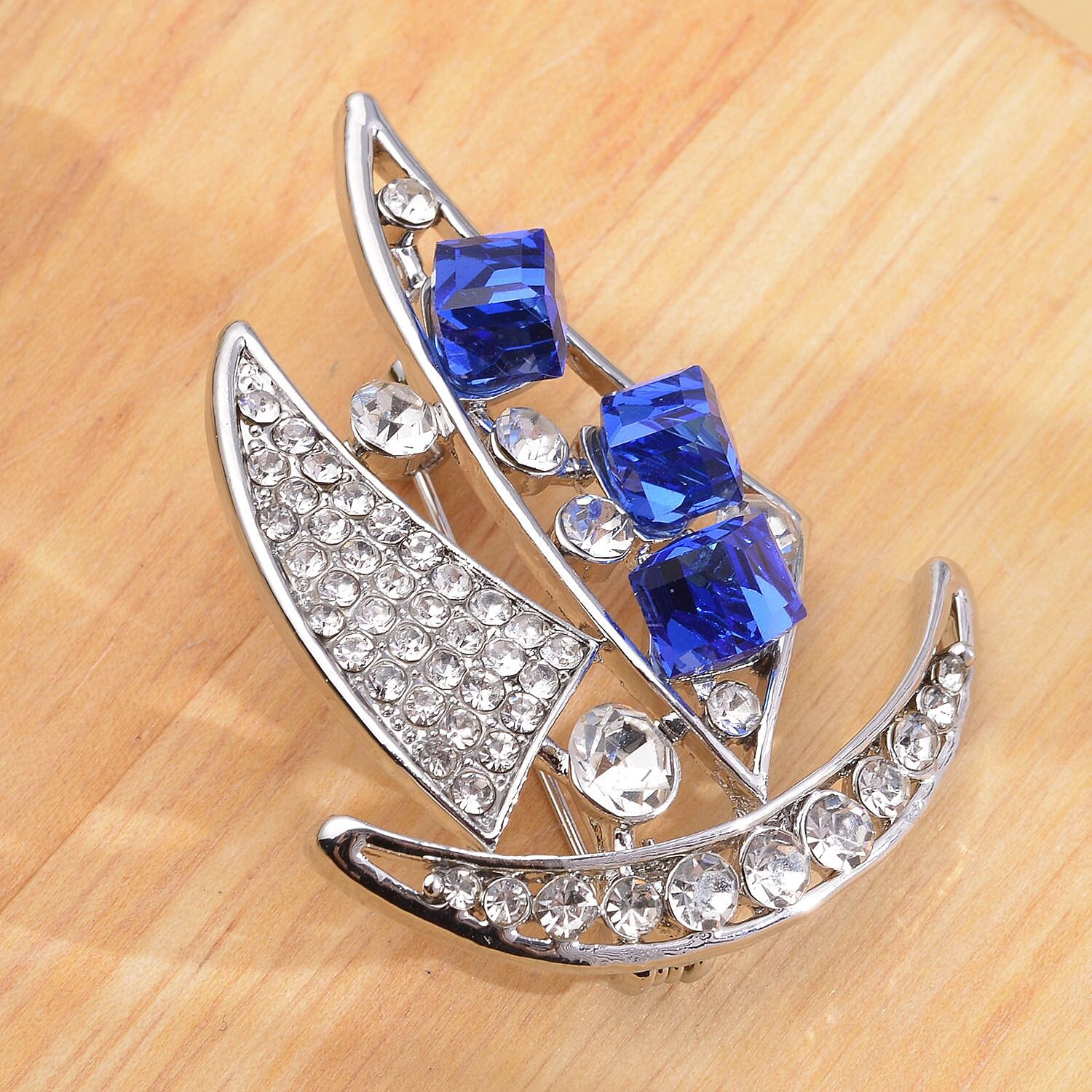 Simulated Blue Sapphire and White Austrian Crystal Ship Brooch in Silver Tone