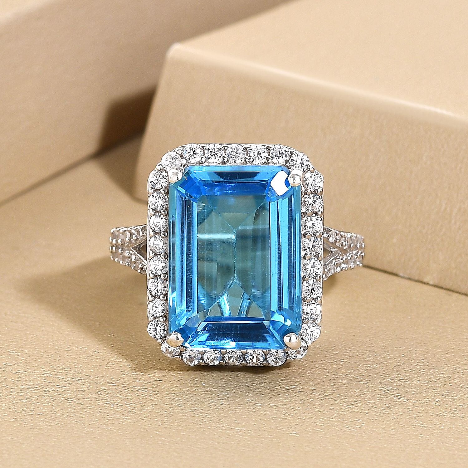 Electric Blue Topaz and Natural Zircon Halo Ring in Platinum Overlay Sterling Silver 10.17 Ct.