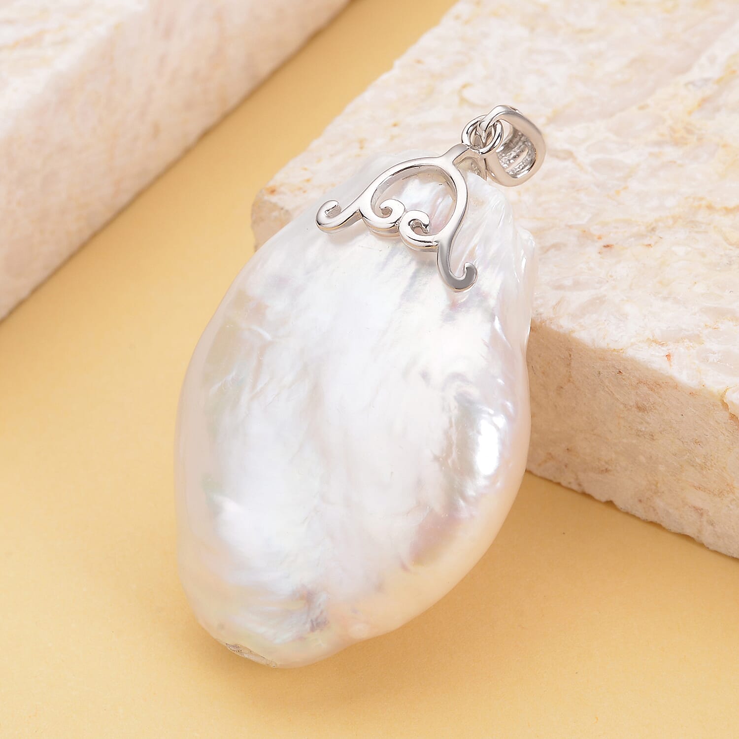 White Baroque Pearl Pendant in Rhodium Overlay Sterling Silver.