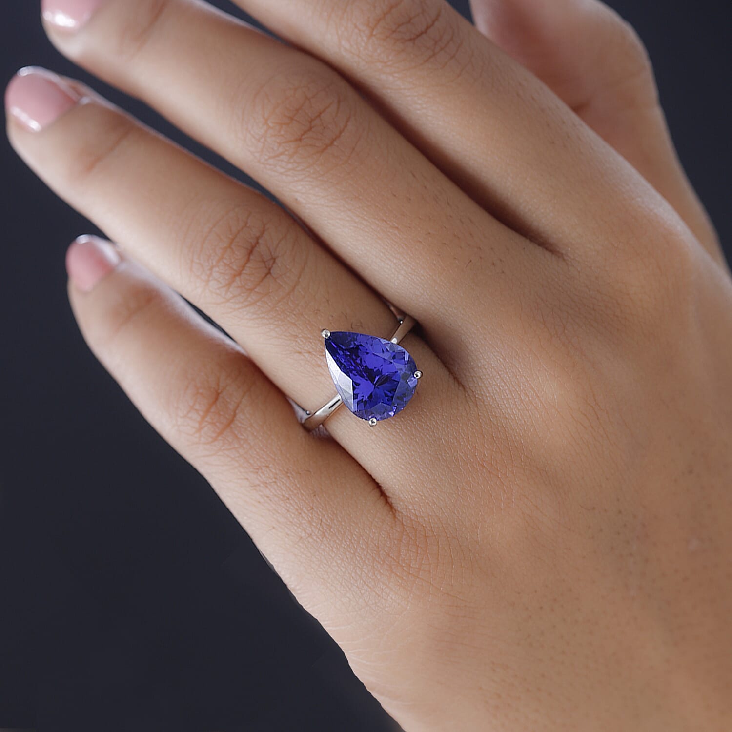 RHAPSODY 950 Platinum AAAA Tanzanite Solitaire Ring 5.24 Ct, Platinum Wt. 6.45 Gms. RHAPSODY 950 Platinum AAAA Tanzanite Solitaire Ring 5.24 Ct, Platinum Wt. 6.45 Gms.