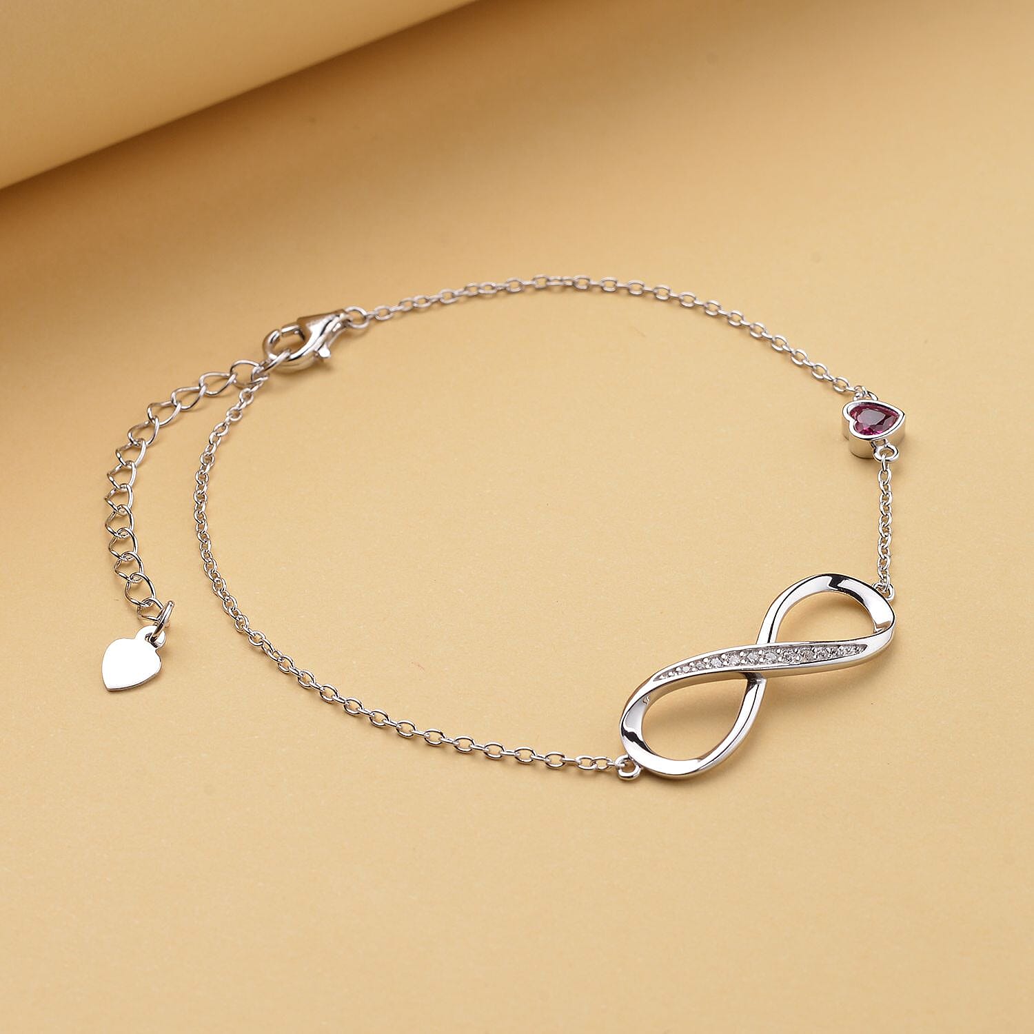 Simulated Red Sapphire and Simulated Diamond Infinity Bracelet (Size - 7.5 with 1.5 Inch Extender) in Rhodium Overlay Sterling Silver.