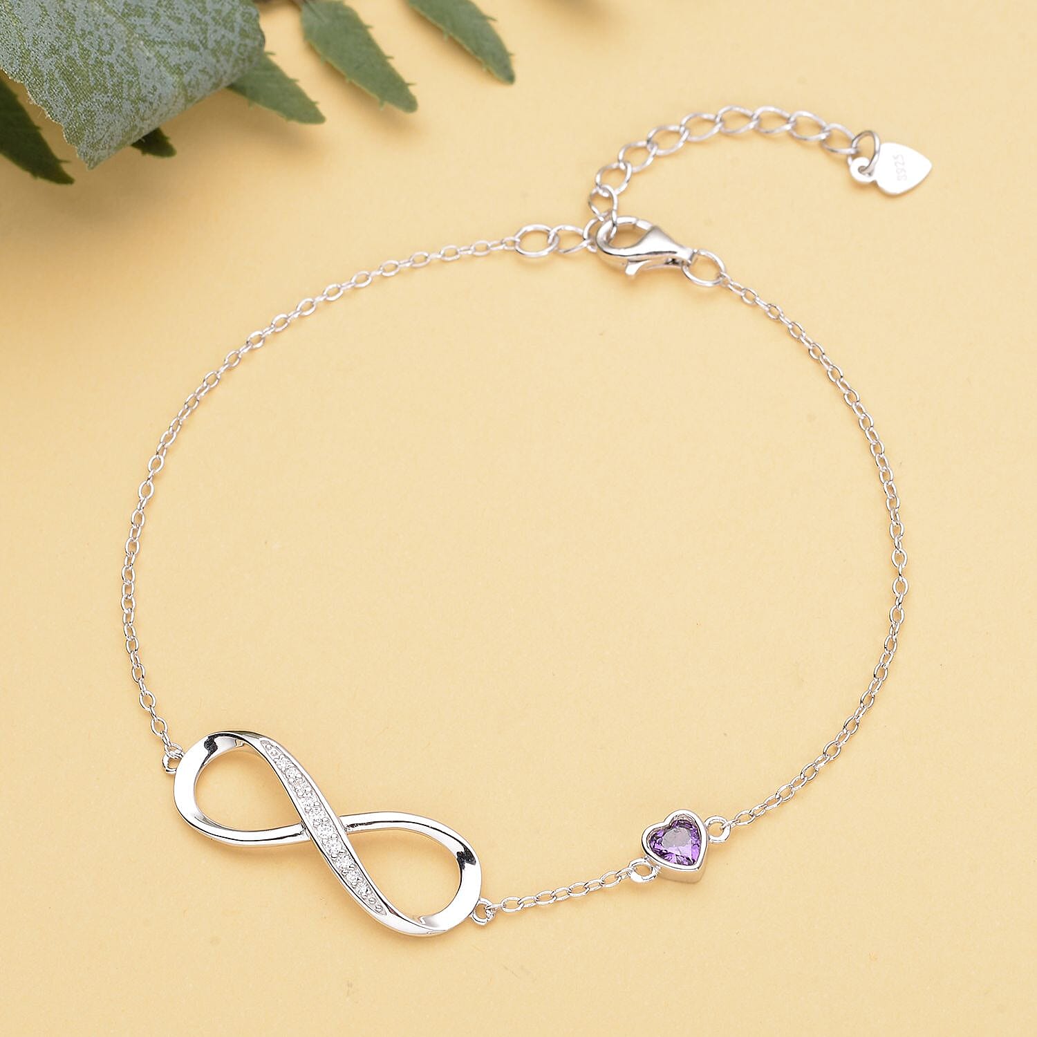 Simulated Purple Sapphire and Simulated Diamond Infinity Bracelet (Size 7.5-1.5 Inch Ext.) in Rhodium Overlay Sterling Silver.