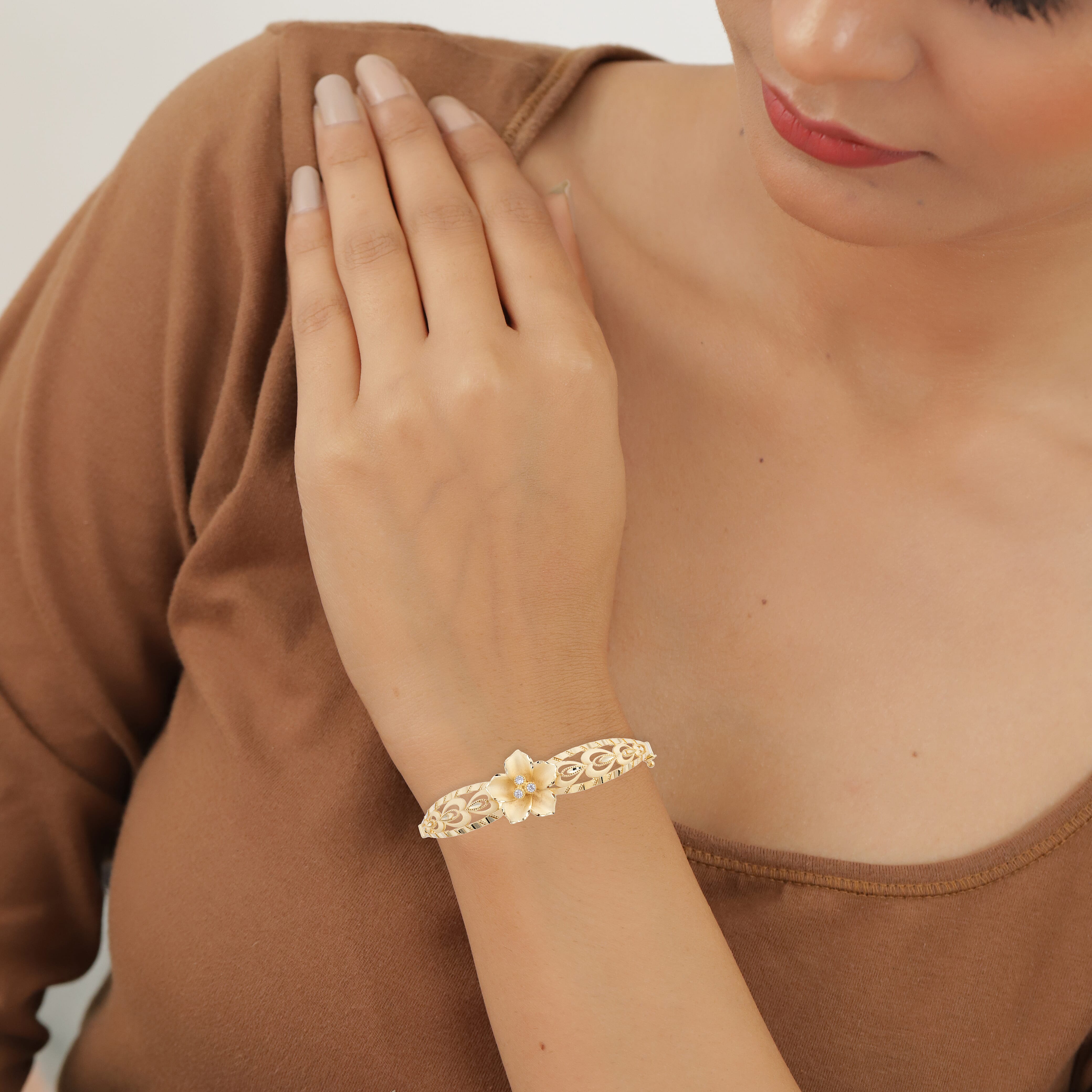 Close Out Deal - 9K Yellow Gold Natural Cambodian Zircon Diamond Cut Floral Bangle (Size 7) with Clasp, Gold Wt 7.60 Gms