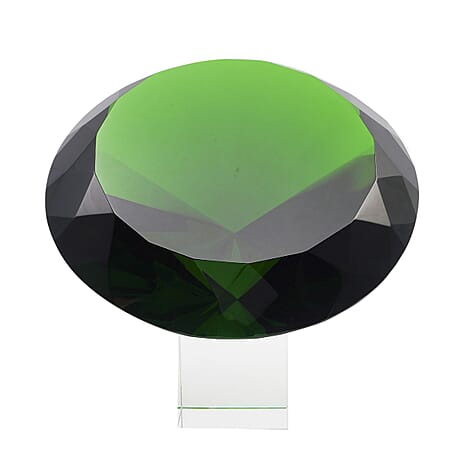 Diamond Shaped Green Coloured Crystal With Cubed Base and a Pair of Gloves