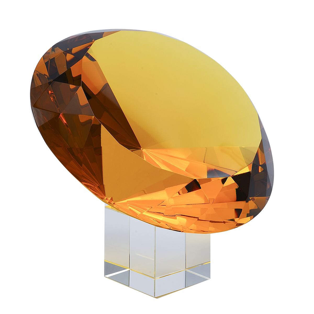 Diamond Shaped Yellow Coloured Crystal With Cubed Base and a Pair of Gloves