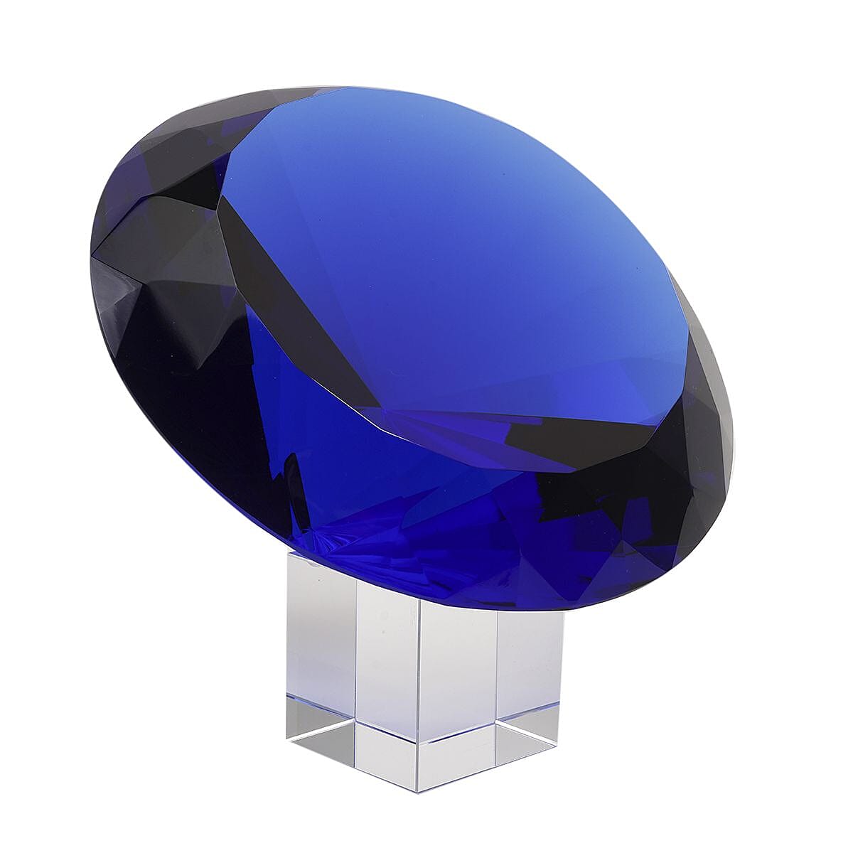 Diamond Shaped Blue Coloured Crystal With Cubed Base and a Pair of Gloves