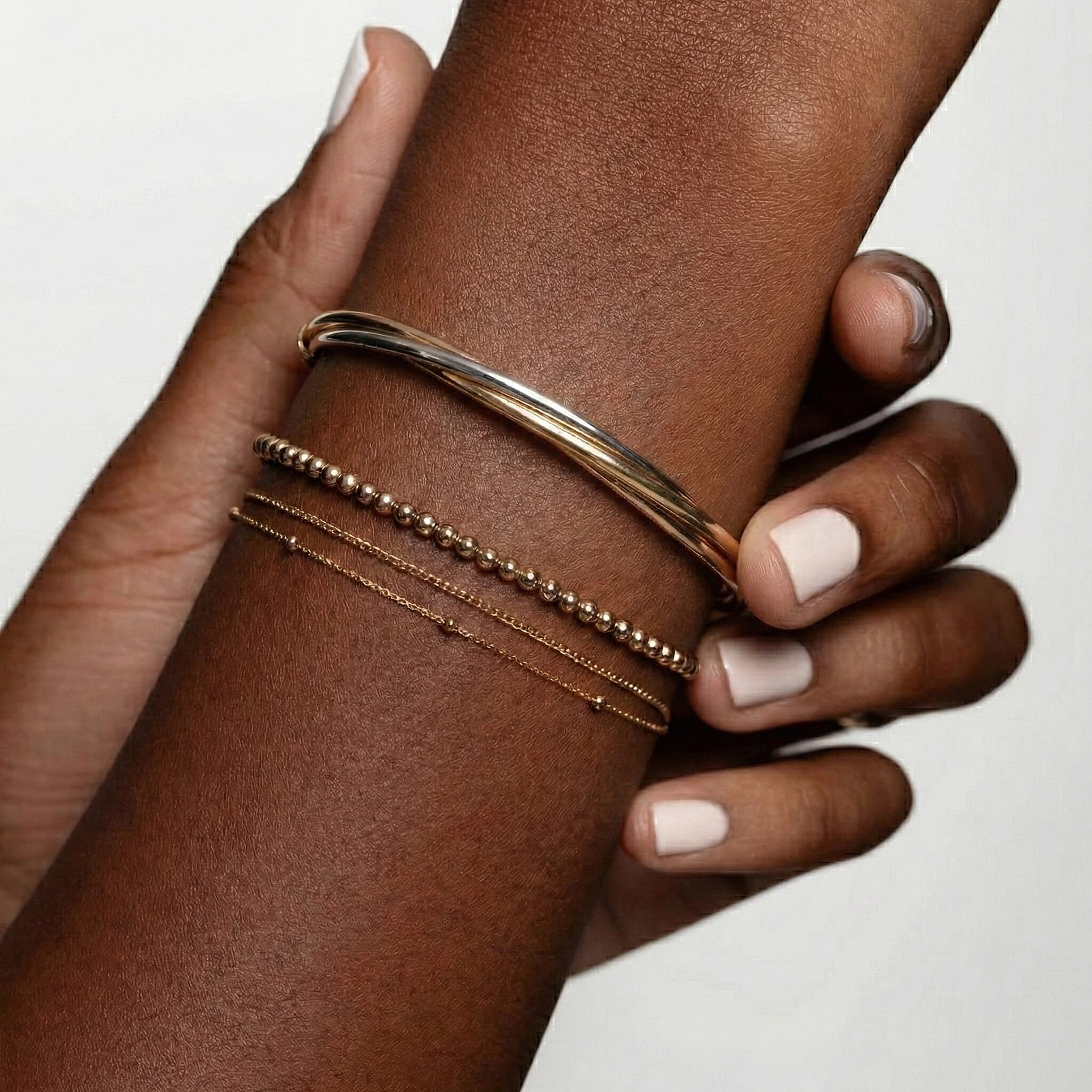 9K Three Colour Gold 4mm Twist Tube Bangle