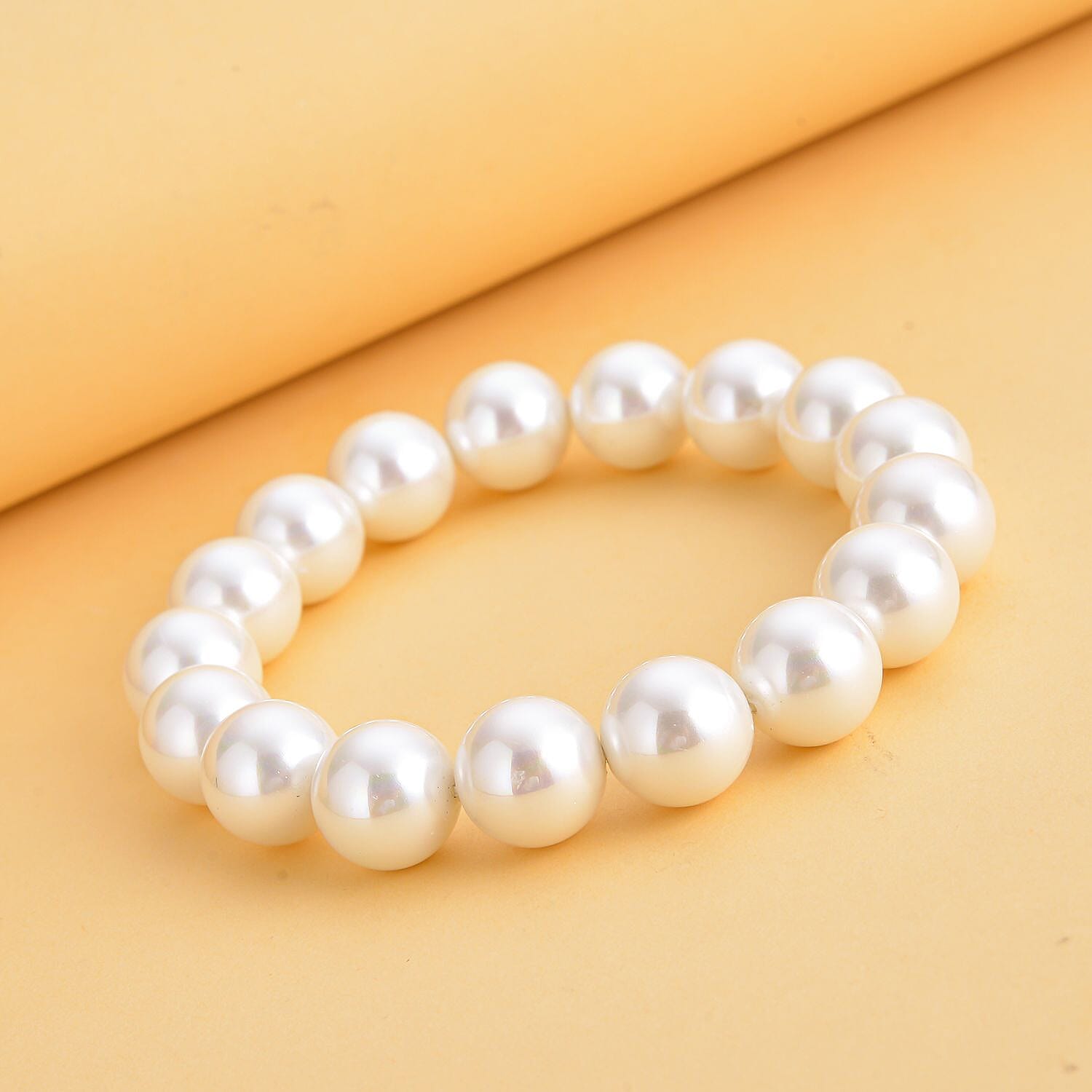 White Shell Pearl Stone Bracelet ( Size- 6.5 strachable) 176.00 ct