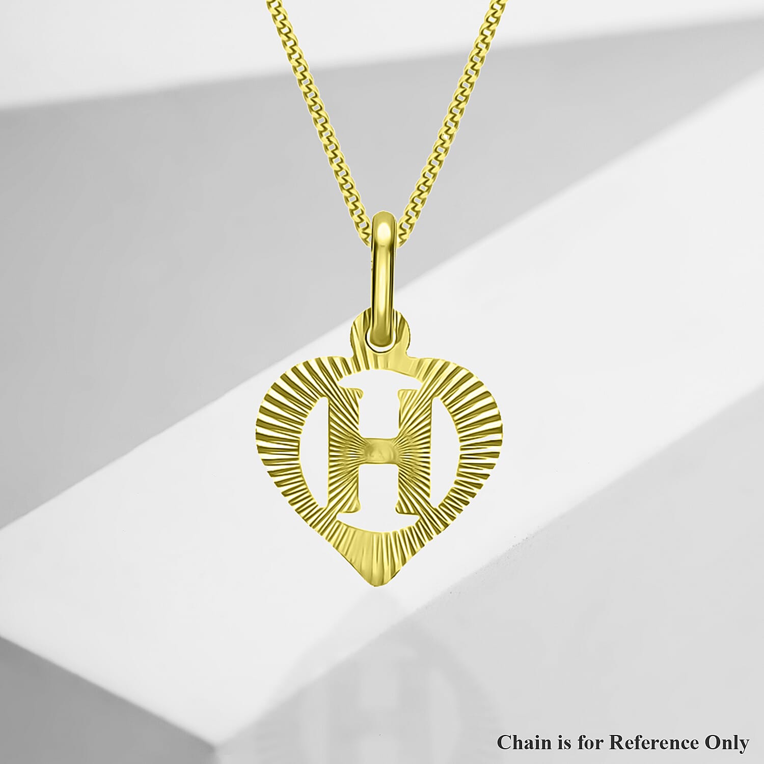 9K Yellow Gold  Pendant,  Gold Wt. 0.21 Gms