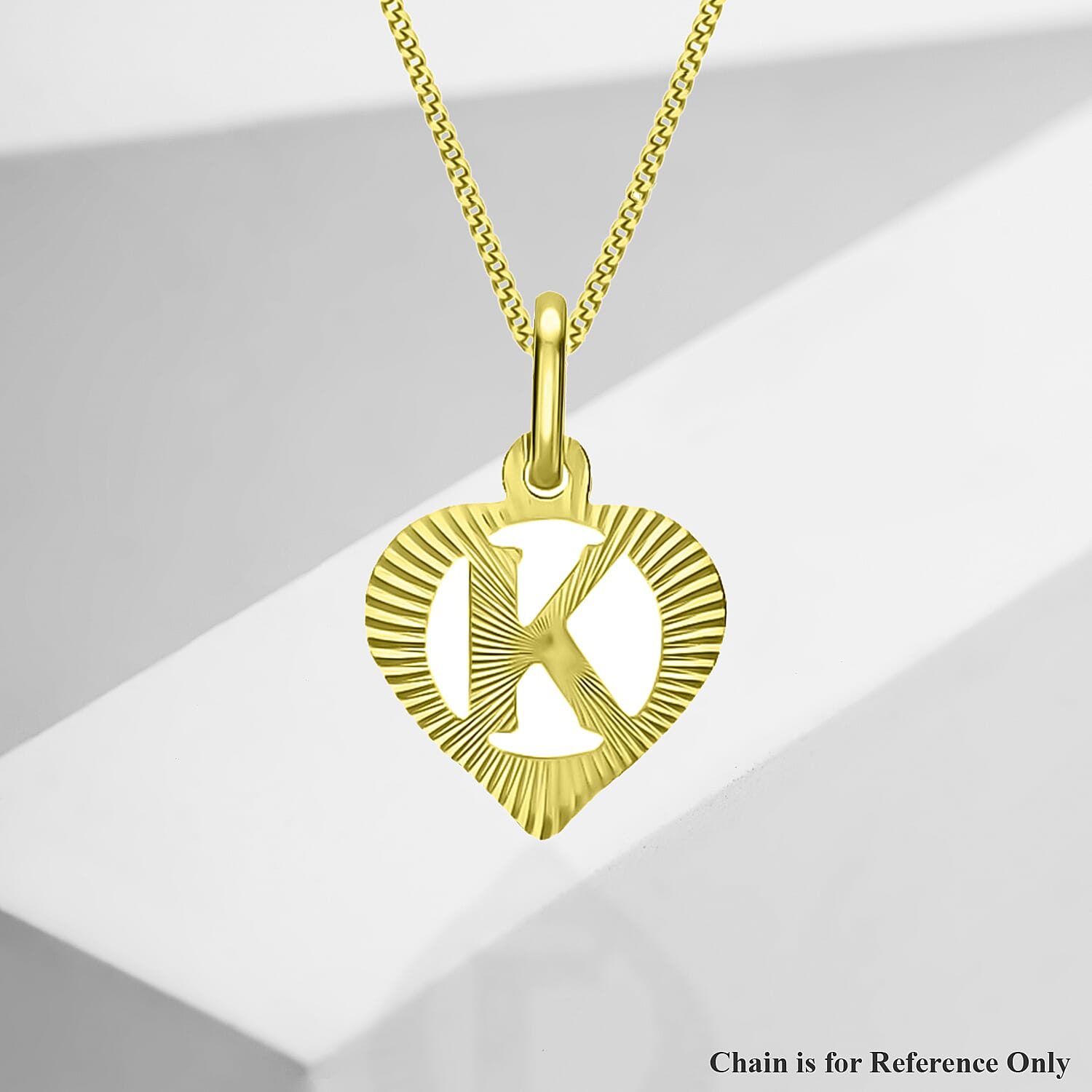 9K Yellow Gold  Pendant,  Gold Wt. 0.21 Gms