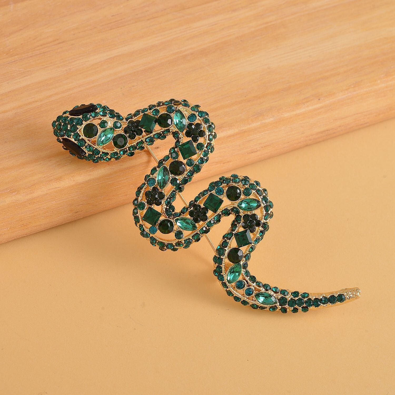 Simulated Black Spinel, Simulated Chrome Diopside and Green Austrian Crystal Snake Brooch in Yellow Gold Tone.