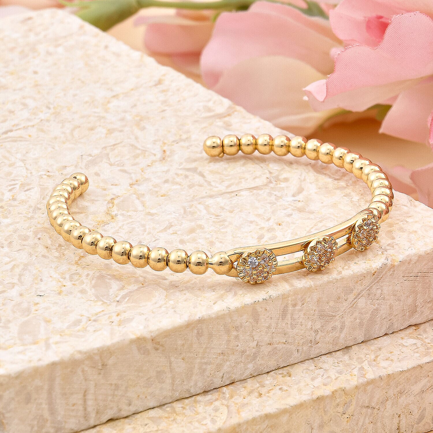 Milan Close Out - Simulated Diamond 3 Moveable Flower Bangle (Size 6.75 Inch)  in Yellow Gold Tone