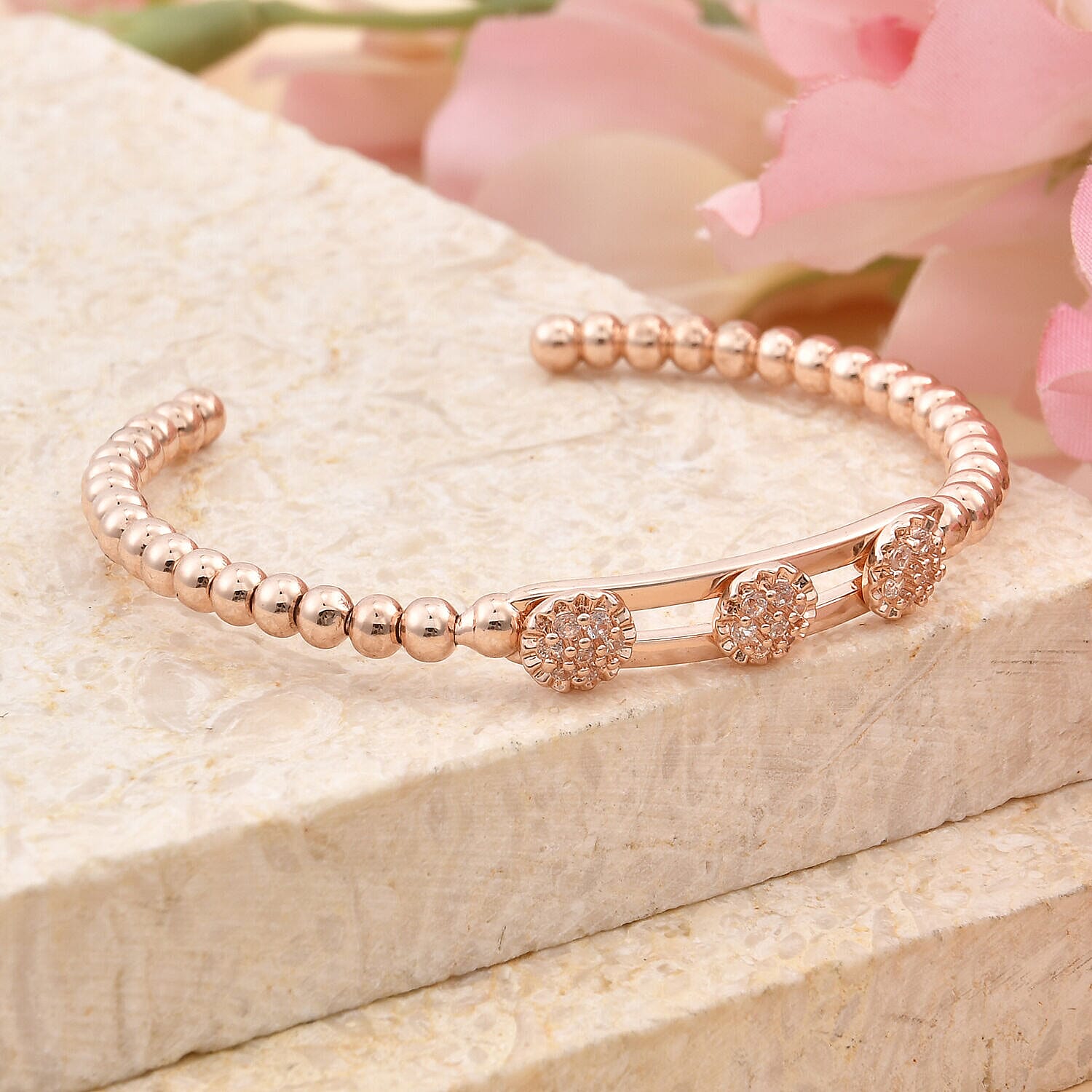 Milan Close Out - Simulated Diamond 3 Moveable Flower Bangle (Size 6.75 Inch)  in Rose Gold Tone