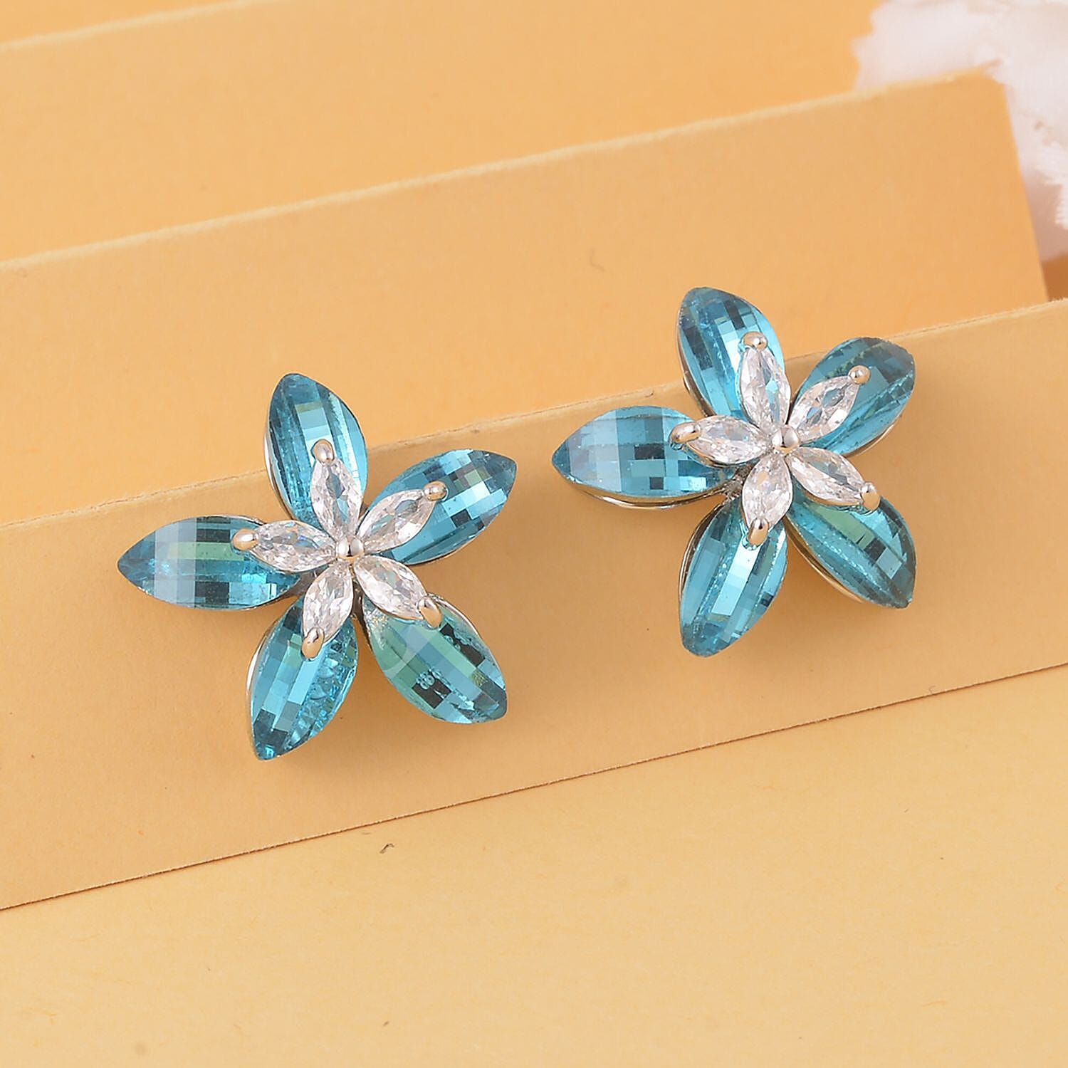 Blue Austrian Crystal and Simulated Diamond Plumeria Floral Earrings in Silver Tone