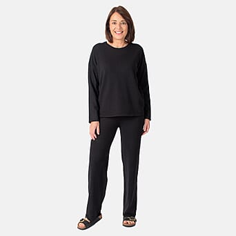 https://tjcuk.sirv.com/Products/73/0/7302674/Knitted-Jumper-and-Trousers-Set-Black_7302674.jpg?w=342&h=342