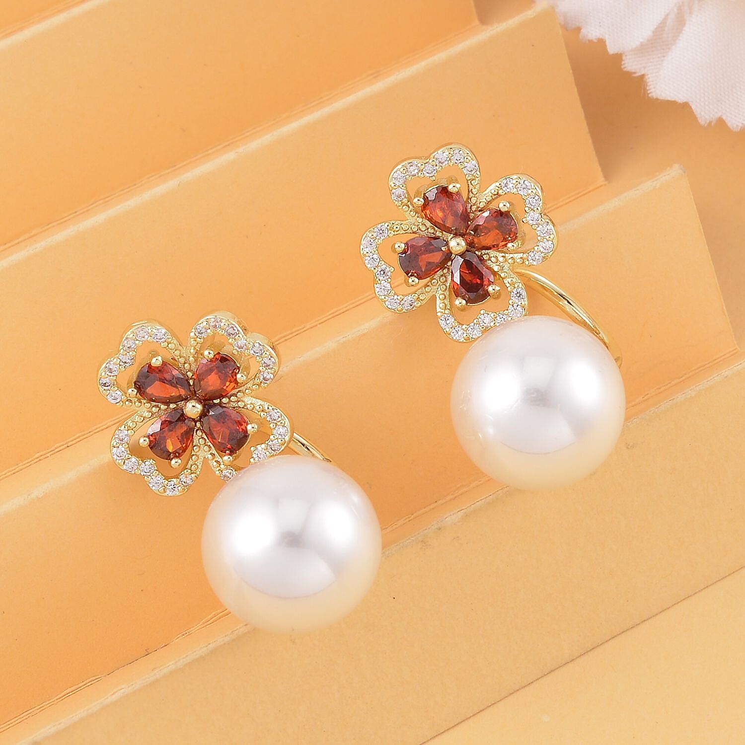 Shell Pearl and Simulated Red Sapphire Stud Earrings in Yellow Gold Tone