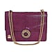 A structured python bag with Dragon spur closure.The sliding chain strap can be worn multiple ways, changing between a shoulder and a top handle bag