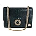 A structured python bag with Dragon spur closure.The sliding chain strap can be worn multiple ways, changing between a shoulder and a top handle bag