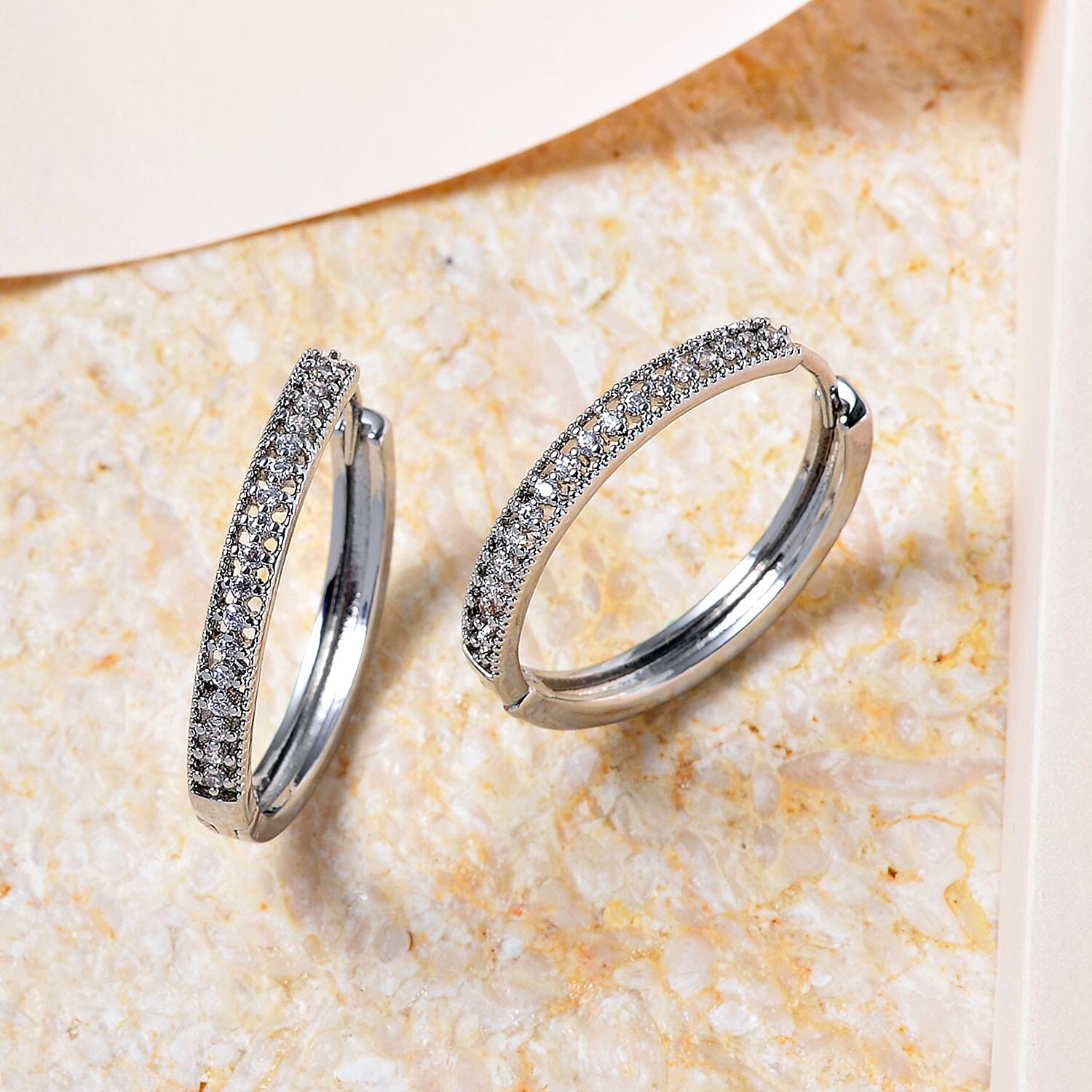 Cubic Zirconia Hoop Earrings in Silver Tone