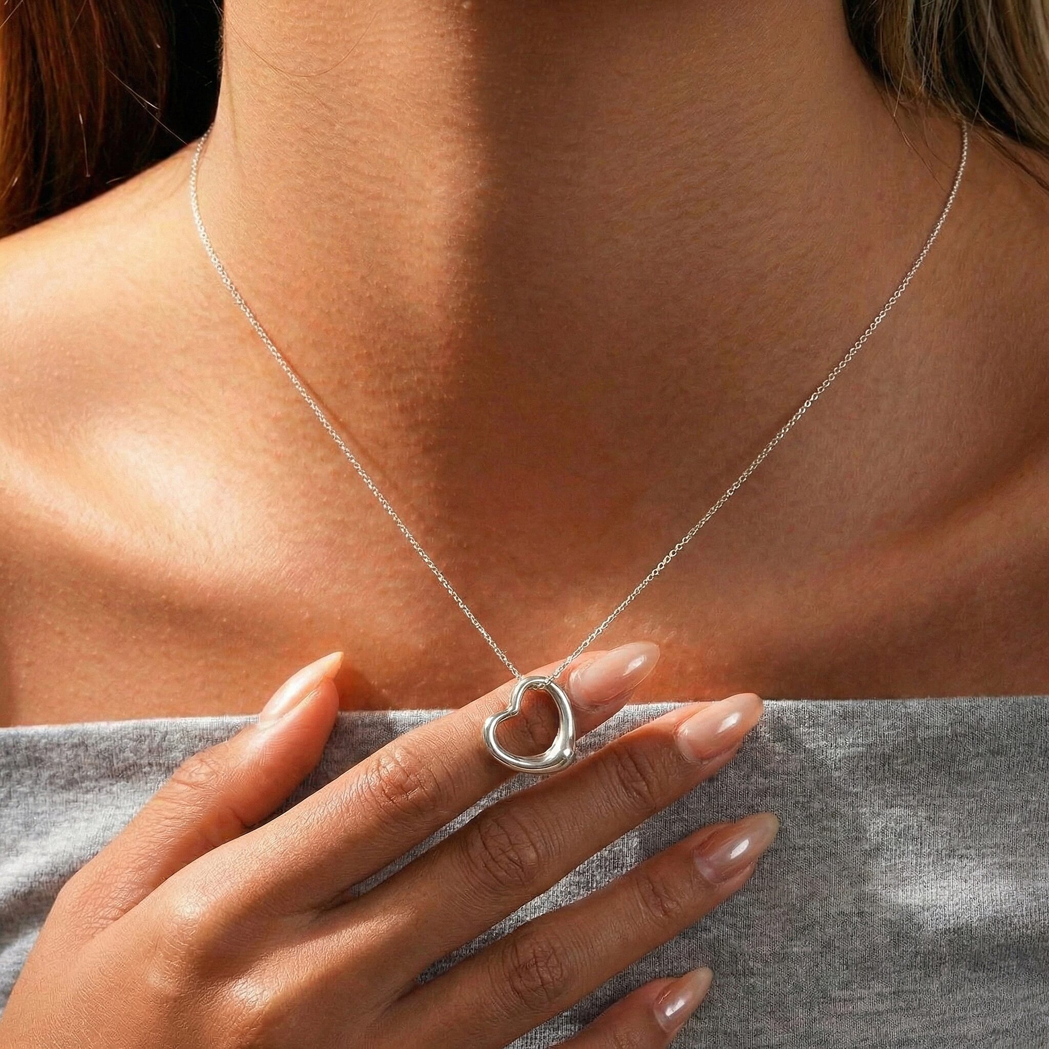 18K W Gold  Pendant,  Gold Wt. 0.55 Gms