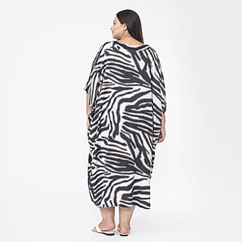 https://tjcuk.sirv.com/Products/73/4/7346144/Tamsy-100-Viscose-V-Neck-Printed-Kaftan-One-Size-Beige-and-Black_7346144_1.jpg?w=342&h=342