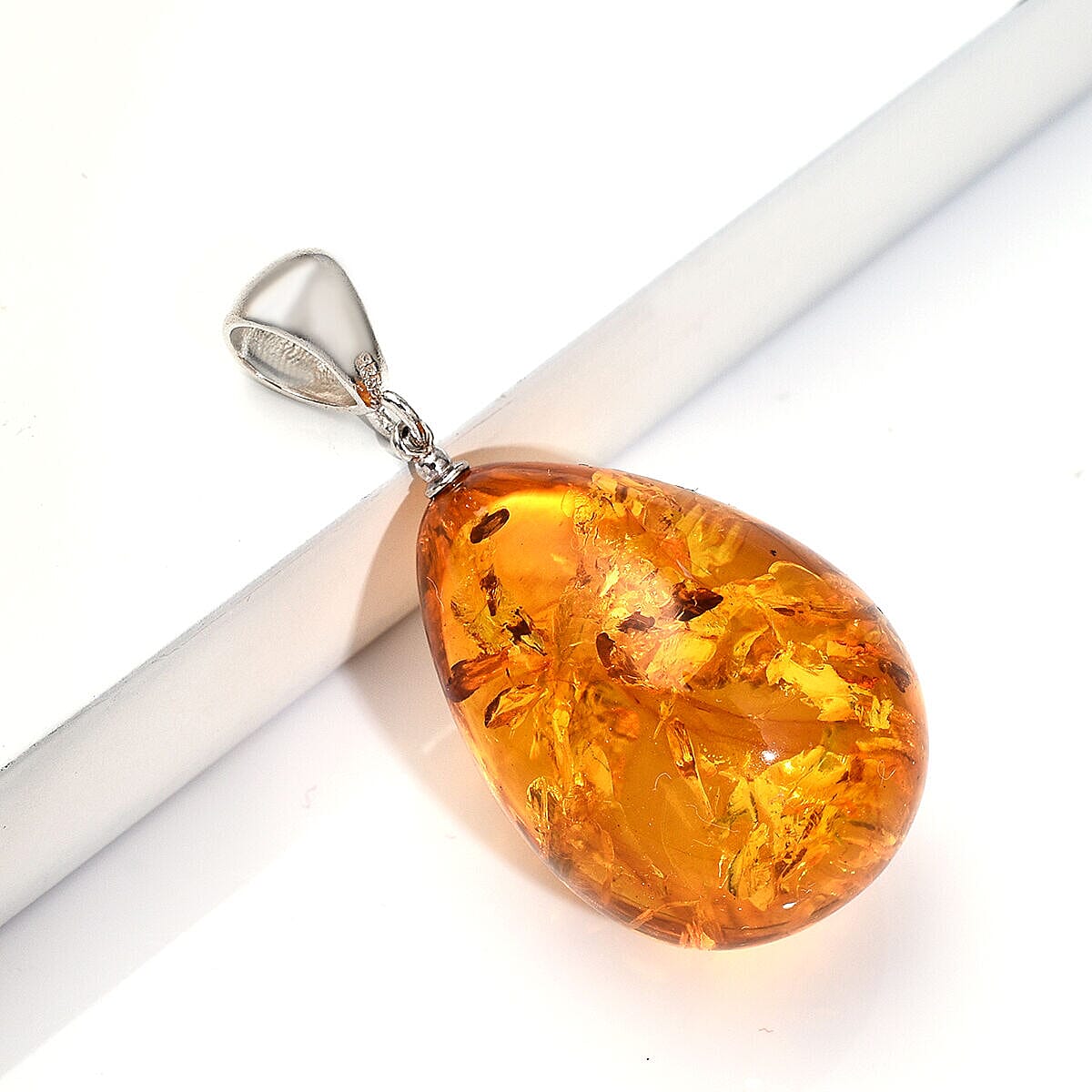 Tucson Special- Amber Pendant in Platinum Overlay Sterling Silver