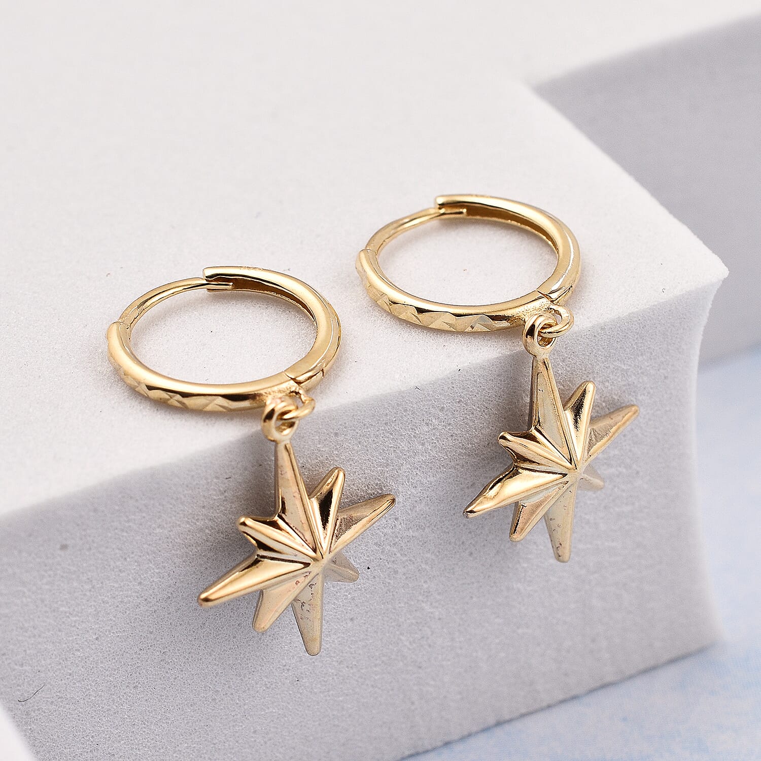 Las Vegas Closeout Deal - 9K Yellow and White Gold Star Earrings