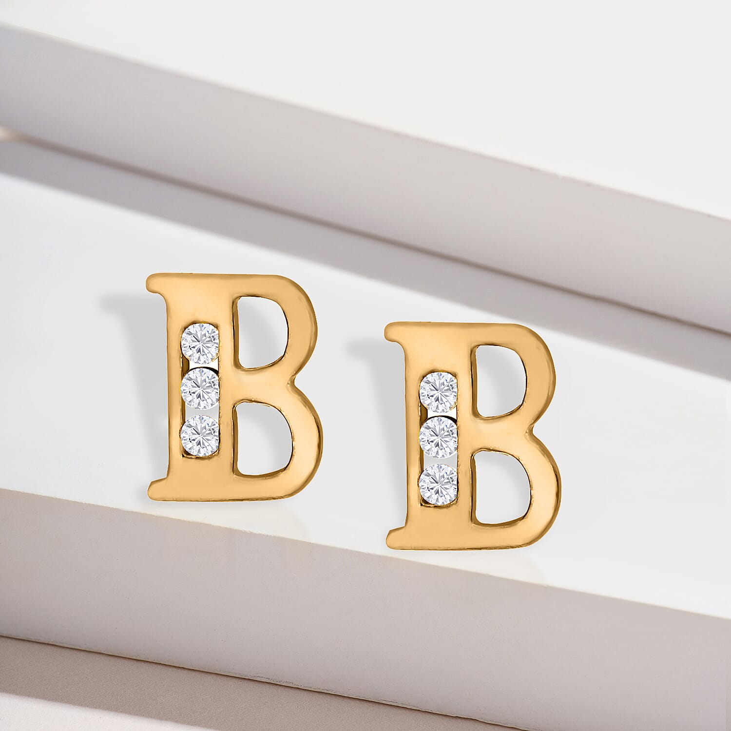 9K Yellow Gold  A   Cubic Zirconia  Earring 0.03 ct,  Gold Wt. 0.6 Gms  0.030  Ct.