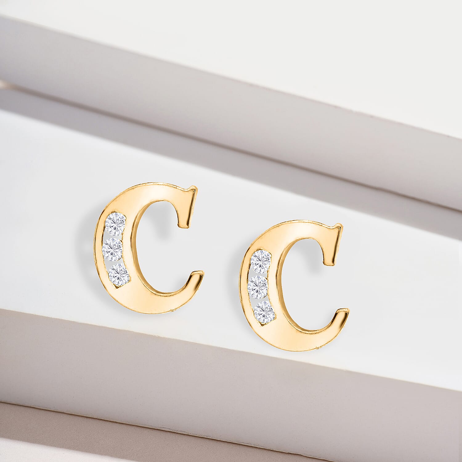 9K Yellow Gold   Cubic Zirconia  Earring 0.03 ct,  Gold Wt. 0.57 Gms  0.030  Ct.