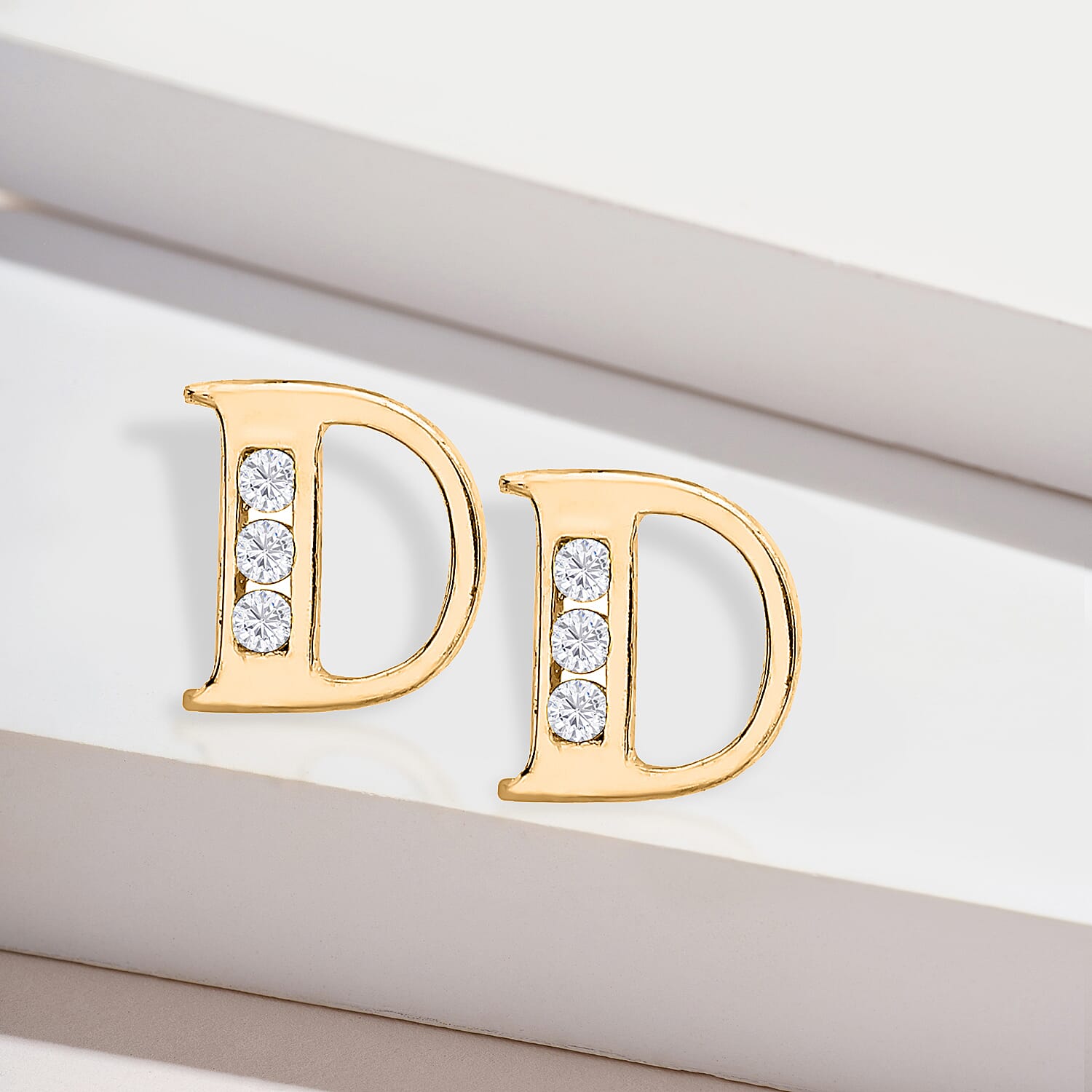 9K Yellow Gold   Cubic Zirconia  Earring 0.03 ct,  Gold Wt. 0.5 Gms  0.030  Ct.