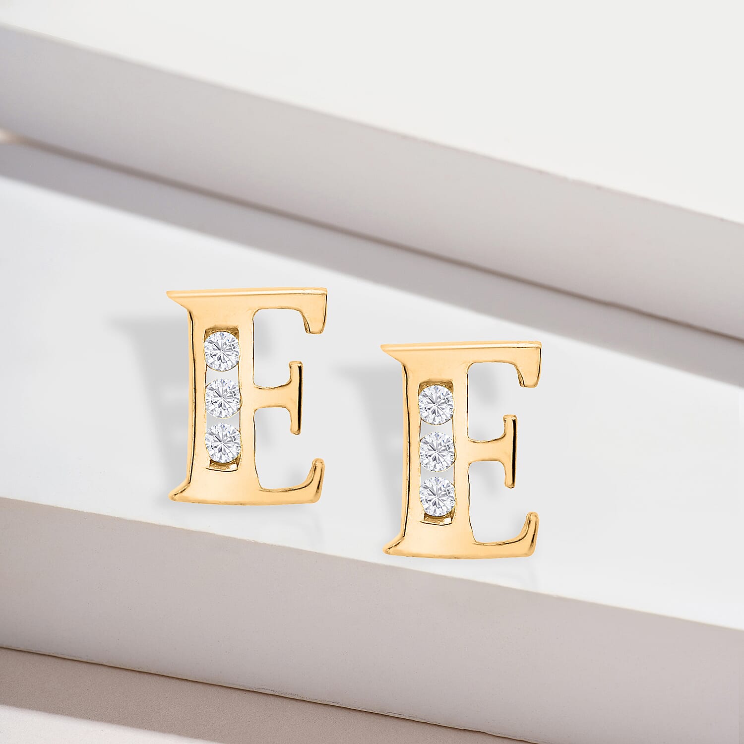 9K Yellow Gold  A   Cubic Zirconia  Earring 0.03 ct,  Gold Wt. 0.56 Gms  0.030  Ct.