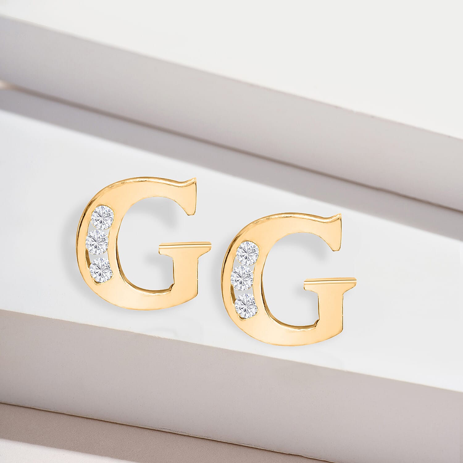 9K Yellow Gold   Cubic Zirconia  Earring 0.03 ct,  Gold Wt. 0.61 Gms  0.030  Ct.