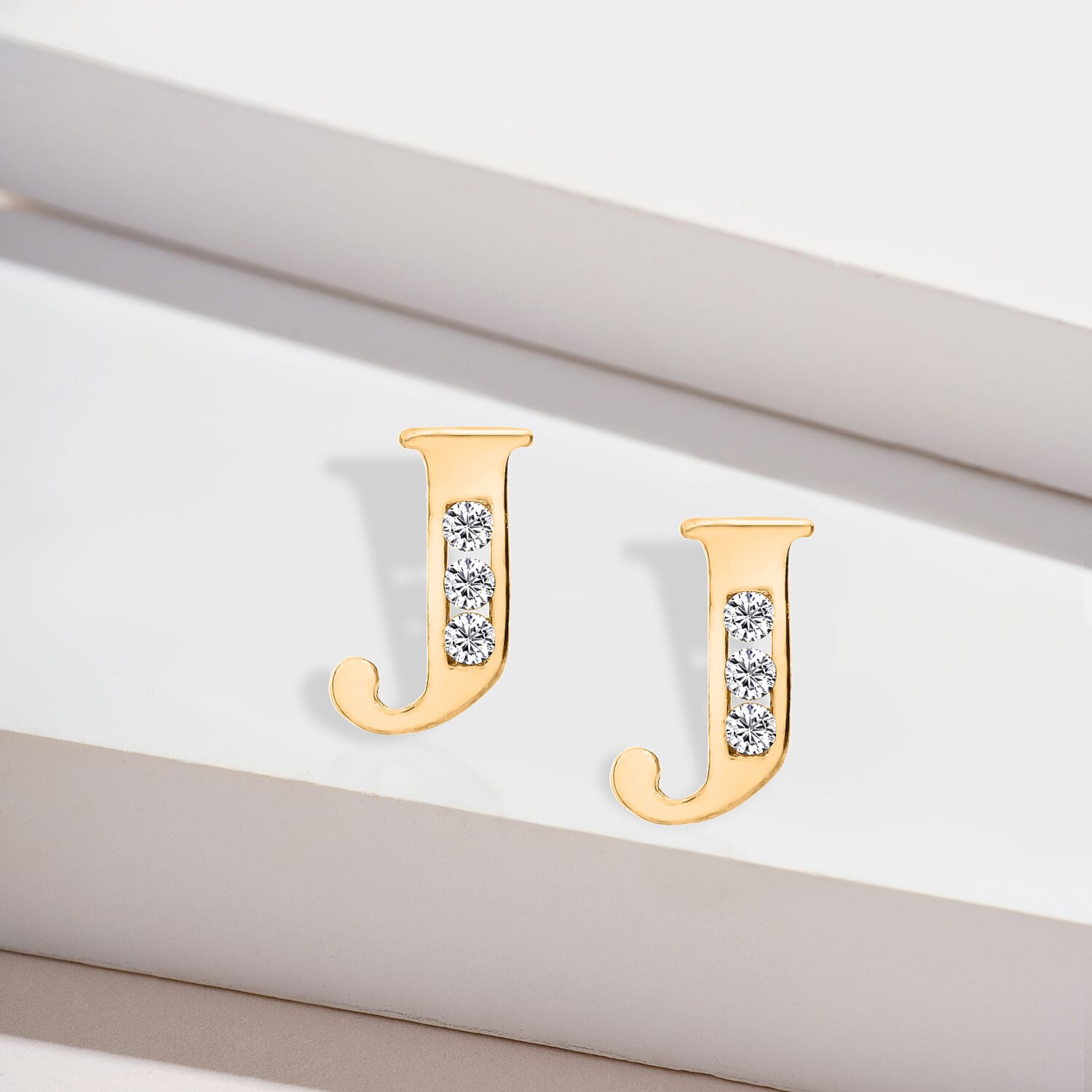 9K Yellow Gold  A   Cubic Zirconia  Earring 0.03 ct,  Gold Wt. 0.48 Gms  0.030  Ct.