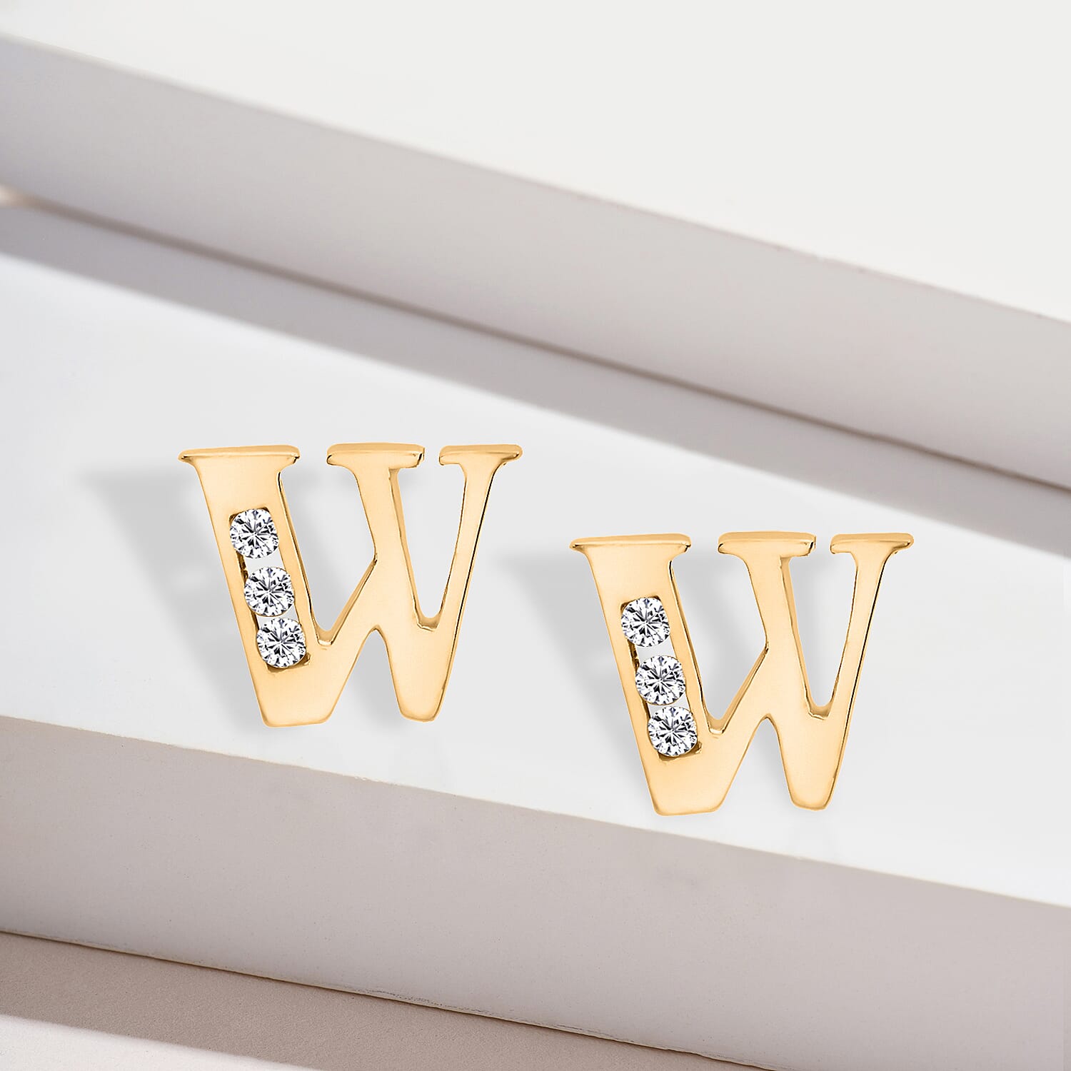 9K Yellow Gold   Cubic Zirconia  Earring 0.03 ct,  Gold Wt. 0.61 Gms  0.030  Ct.