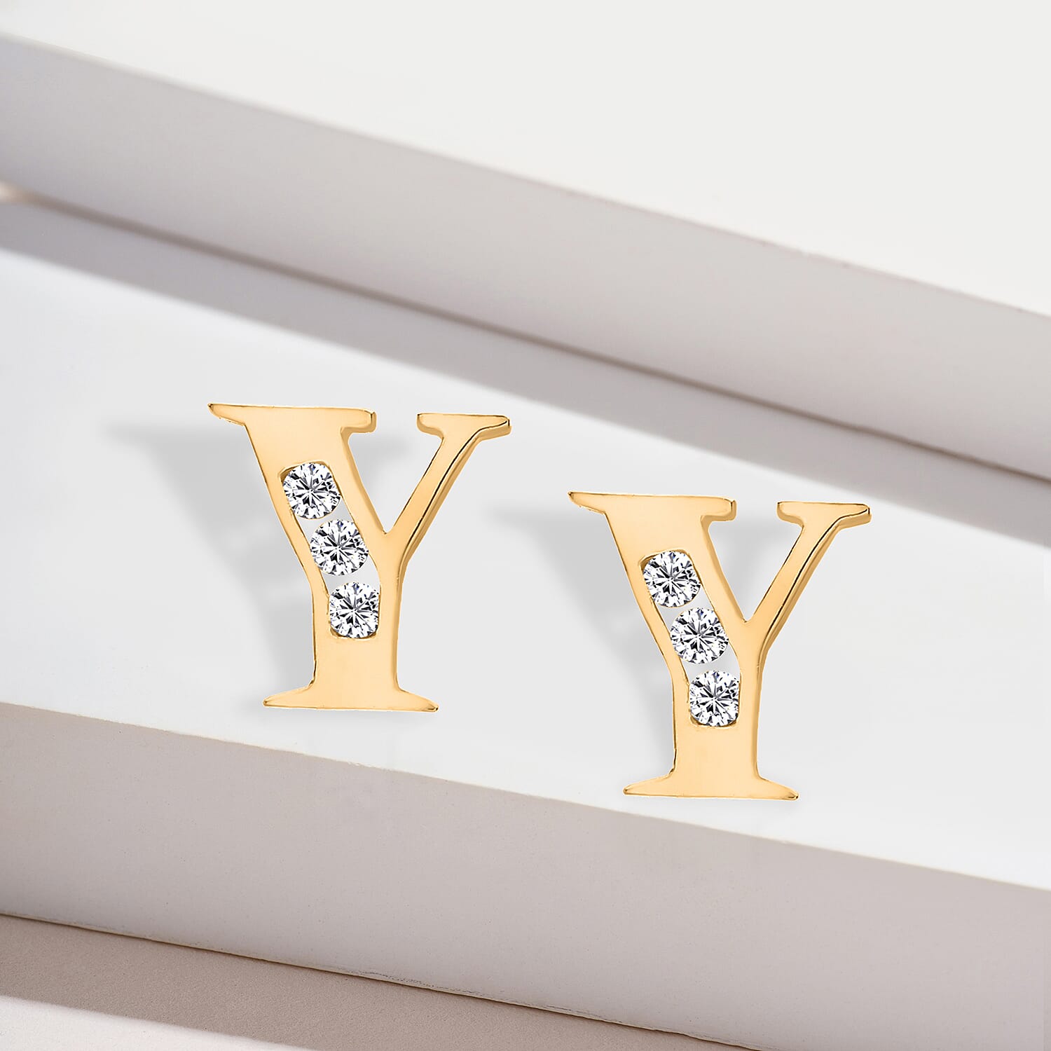 9K Yellow Gold  A   Cubic Zirconia  Earring 0.03 ct,  Gold Wt. 0.5 Gms  0.030  Ct.