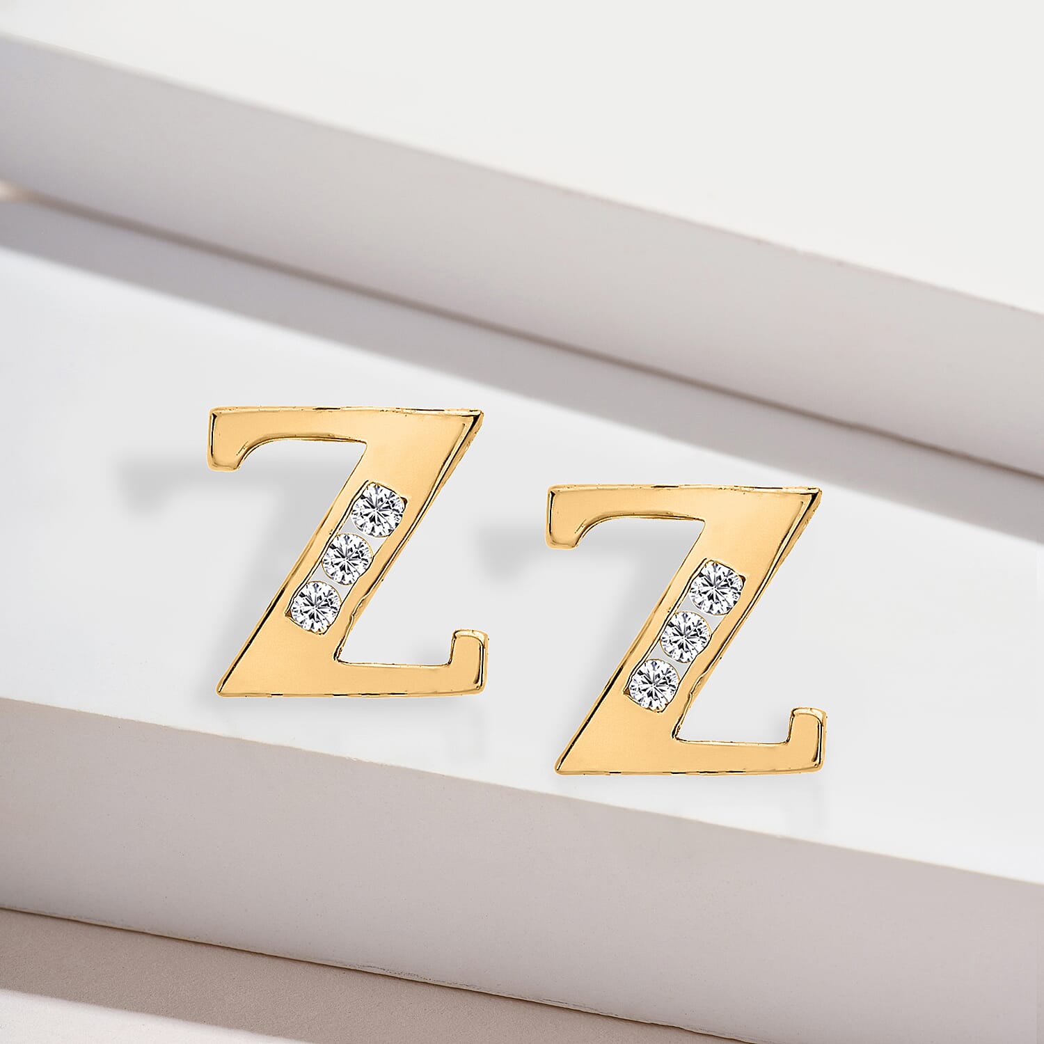 9K Yellow Gold   Cubic Zirconia  Earring 0.03 ct,  Gold Wt. 0.62 Gms  0.030  Ct.