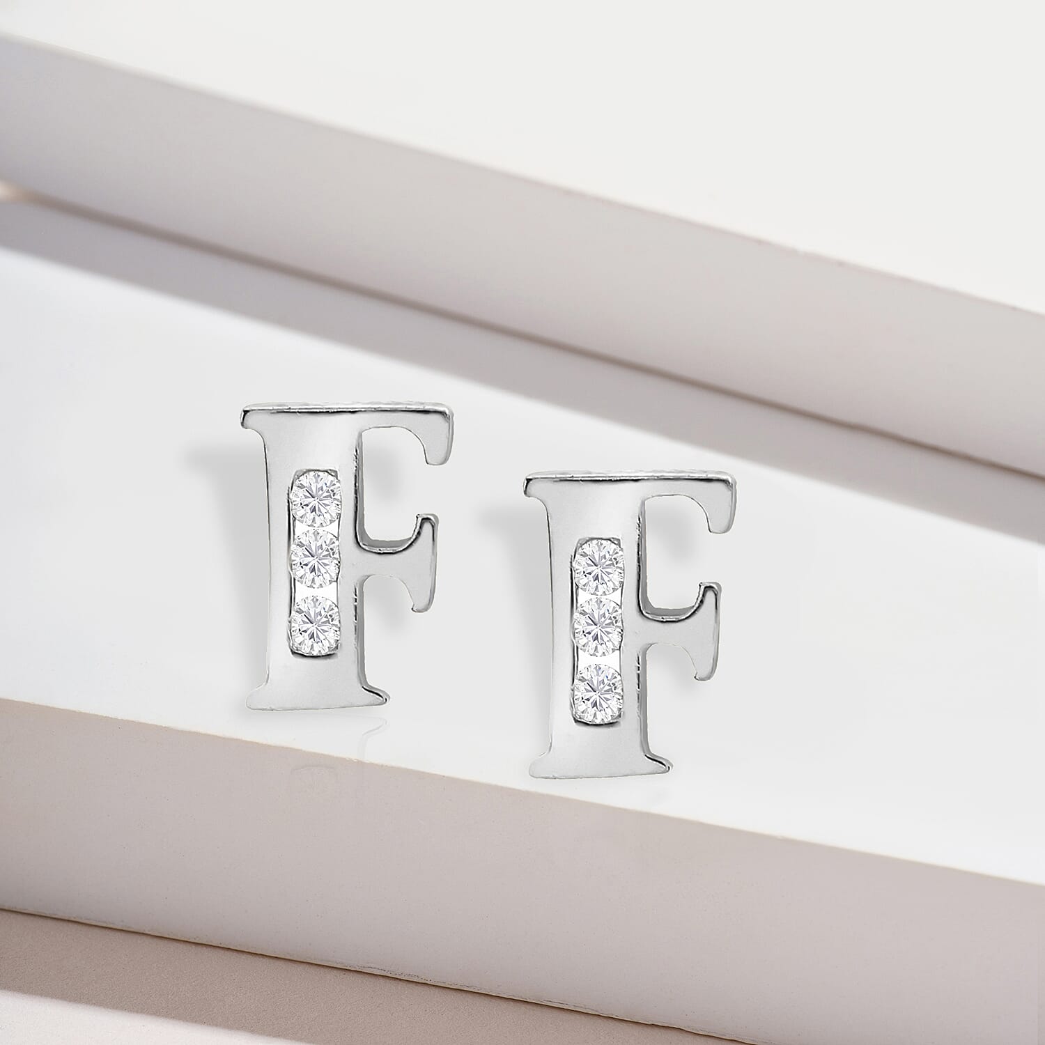 9K White Gold  A   Cubic Zirconia  Earring 0.03 ct,  Gold Wt. 0.51 Gms  0.030  Ct.