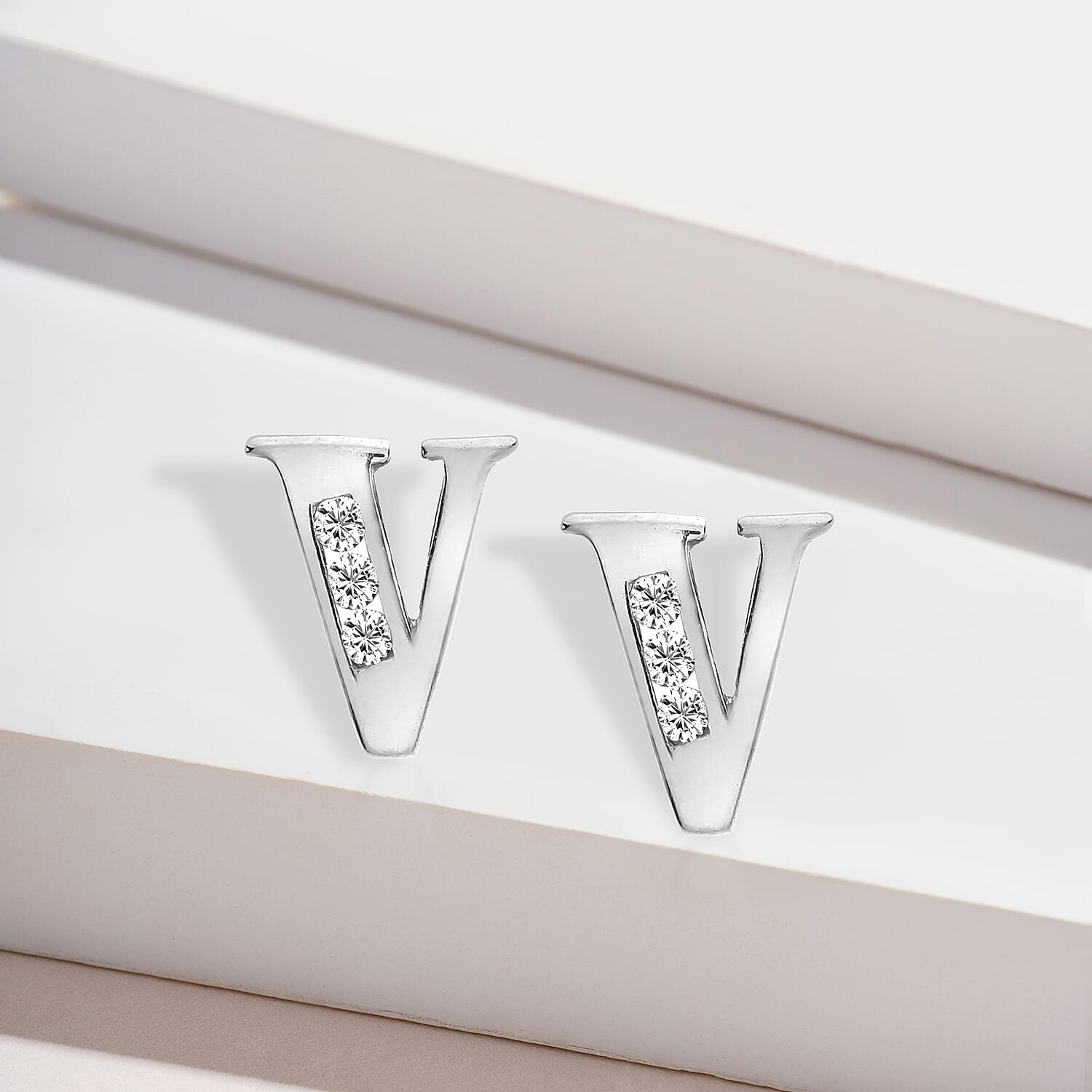 9K White Gold  A   Cubic Zirconia  Earring 0.03 ct,  Gold Wt. 0.58 Gms  0.030  Ct.