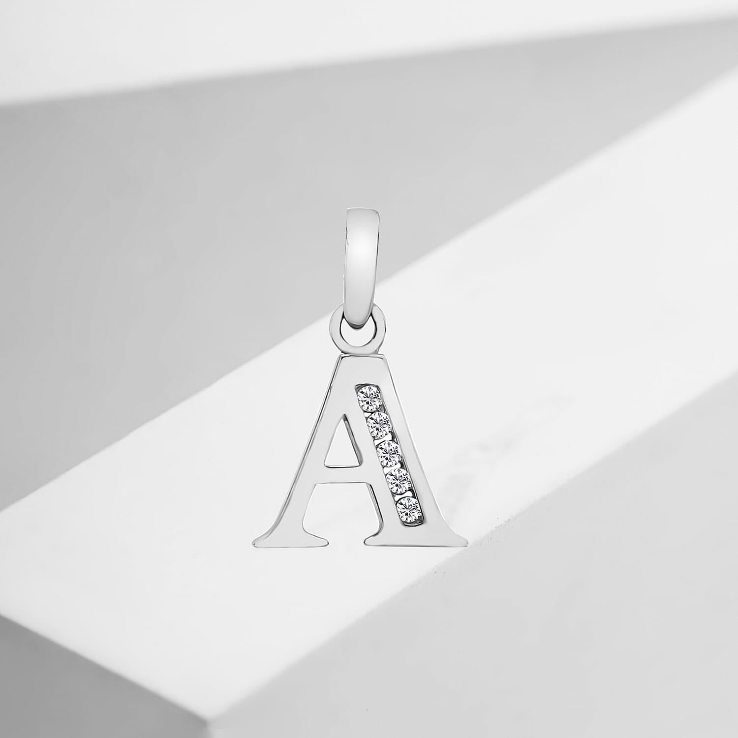 9K White Gold  A   Cubic Zirconia  Pendant 0.03 ct,  Gold Wt. 0.54 Gms  0.025  Ct.