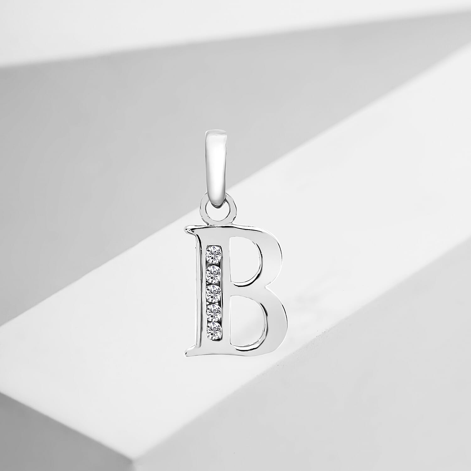 9K White Gold  A   Cubic Zirconia  Pendant 0.03 ct,  Gold Wt. 0.54 Gms  0.025  Ct.