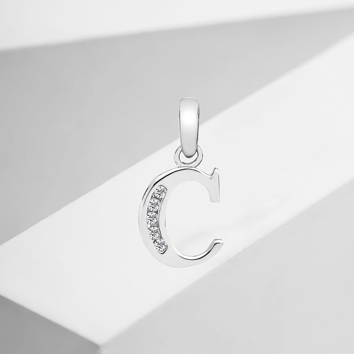 9K White Gold  A   Cubic Zirconia  Pendant 0.03 ct,  Gold Wt. 0.47 Gms  0.025  Ct.