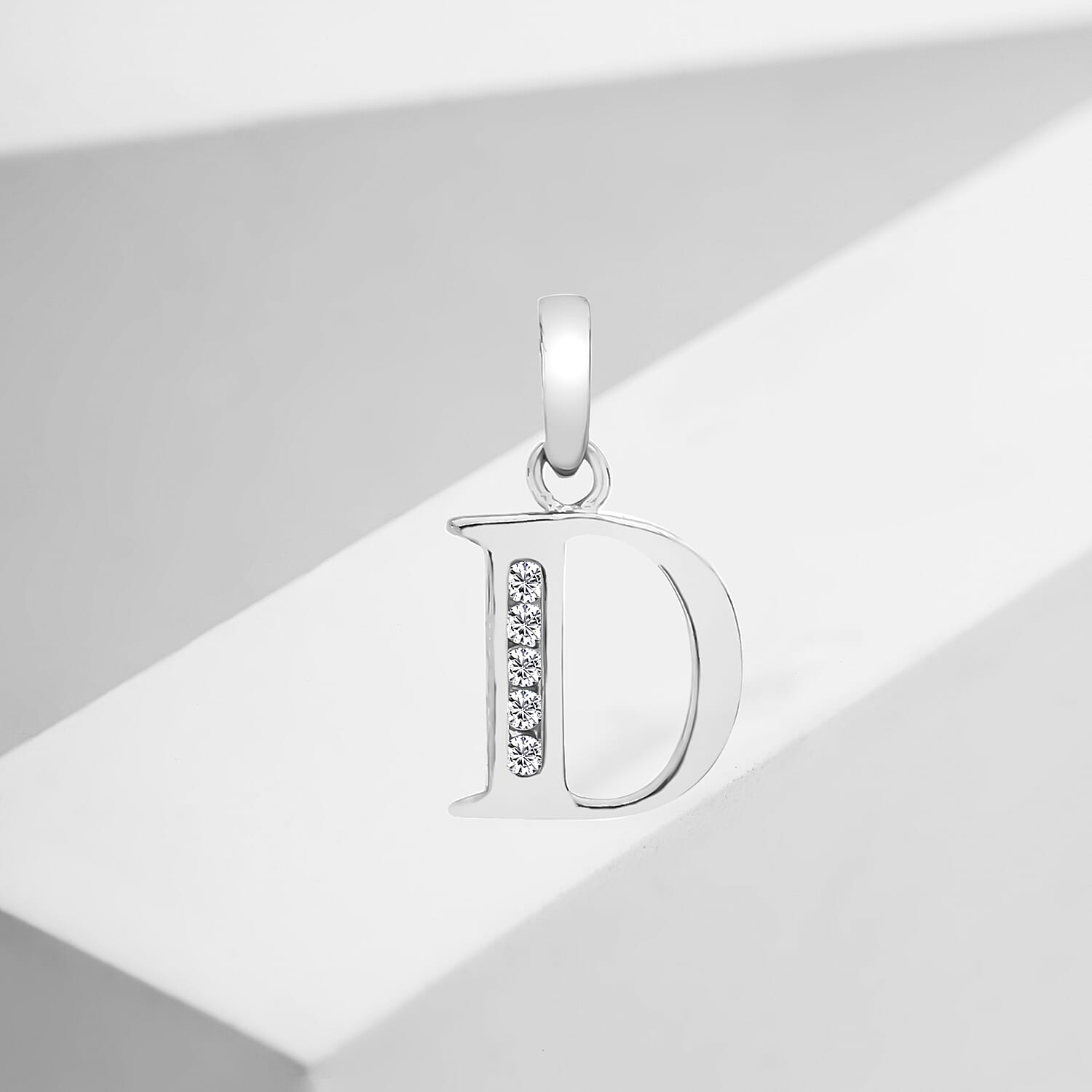 9K White Gold  A   Cubic Zirconia  Pendant 0.03 ct,  Gold Wt. 0.55 Gms  0.025  Ct.