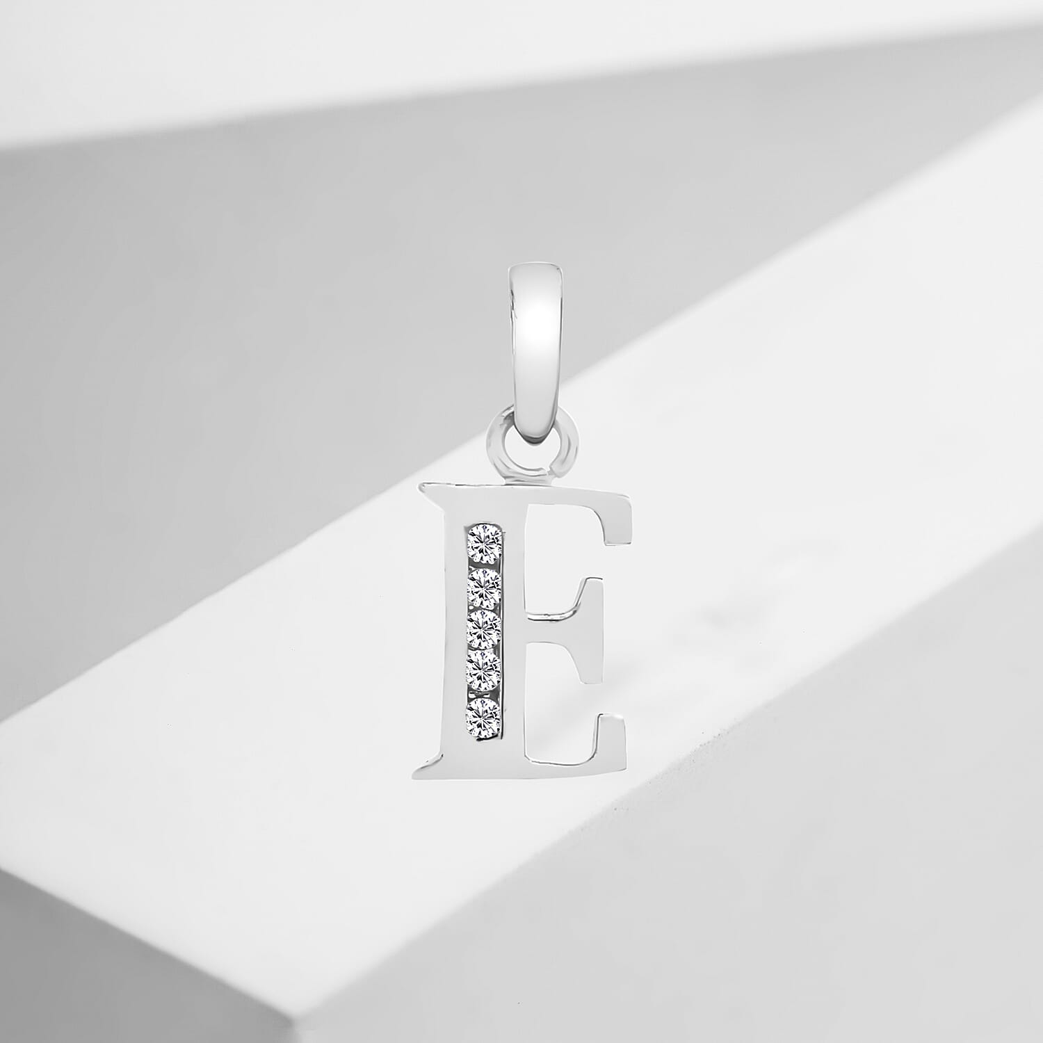 9K White Gold  A   Cubic Zirconia  Pendant 0.03 ct,  Gold Wt. 0.46 Gms  0.025  Ct.