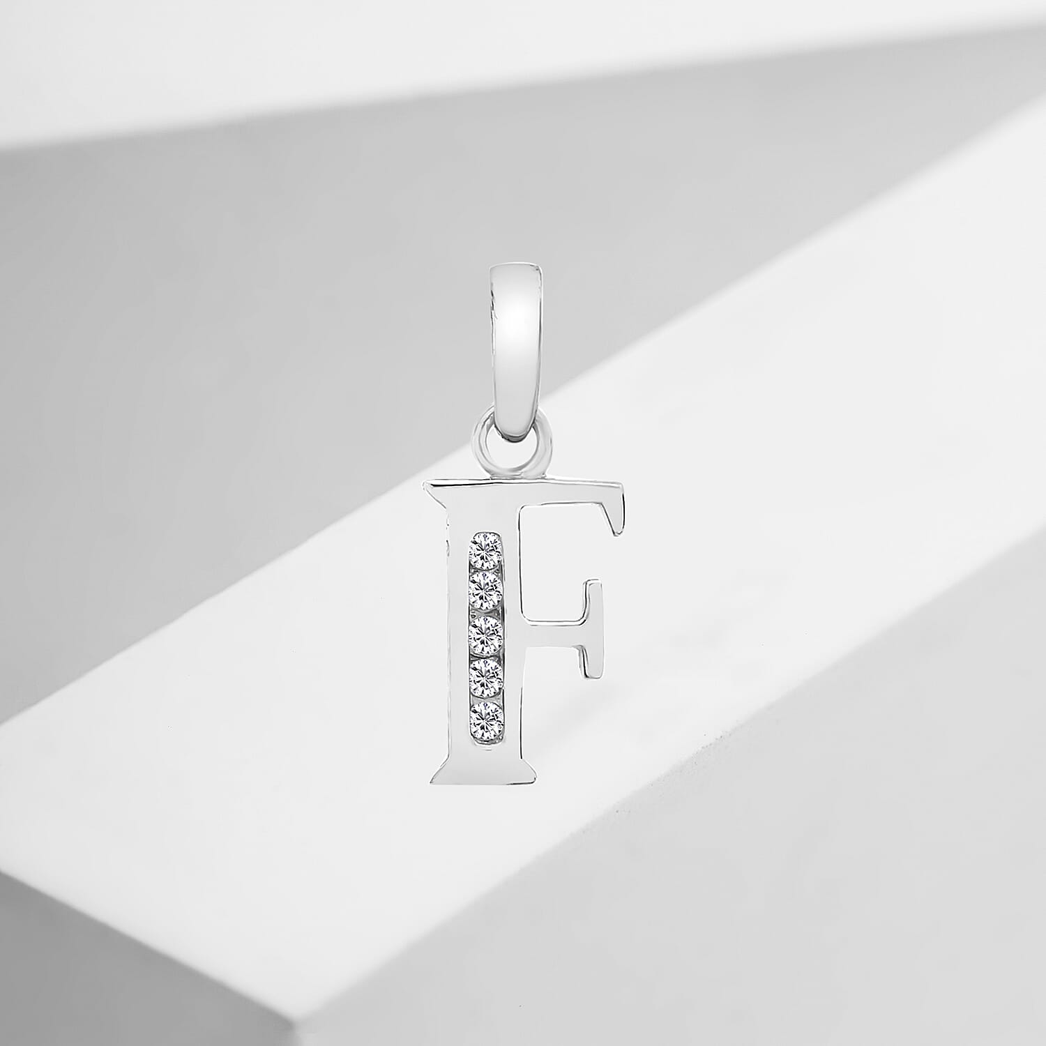 9K White Gold  A   Cubic Zirconia  Pendant 0.03 ct,  Gold Wt. 0.38 Gms  0.025  Ct.