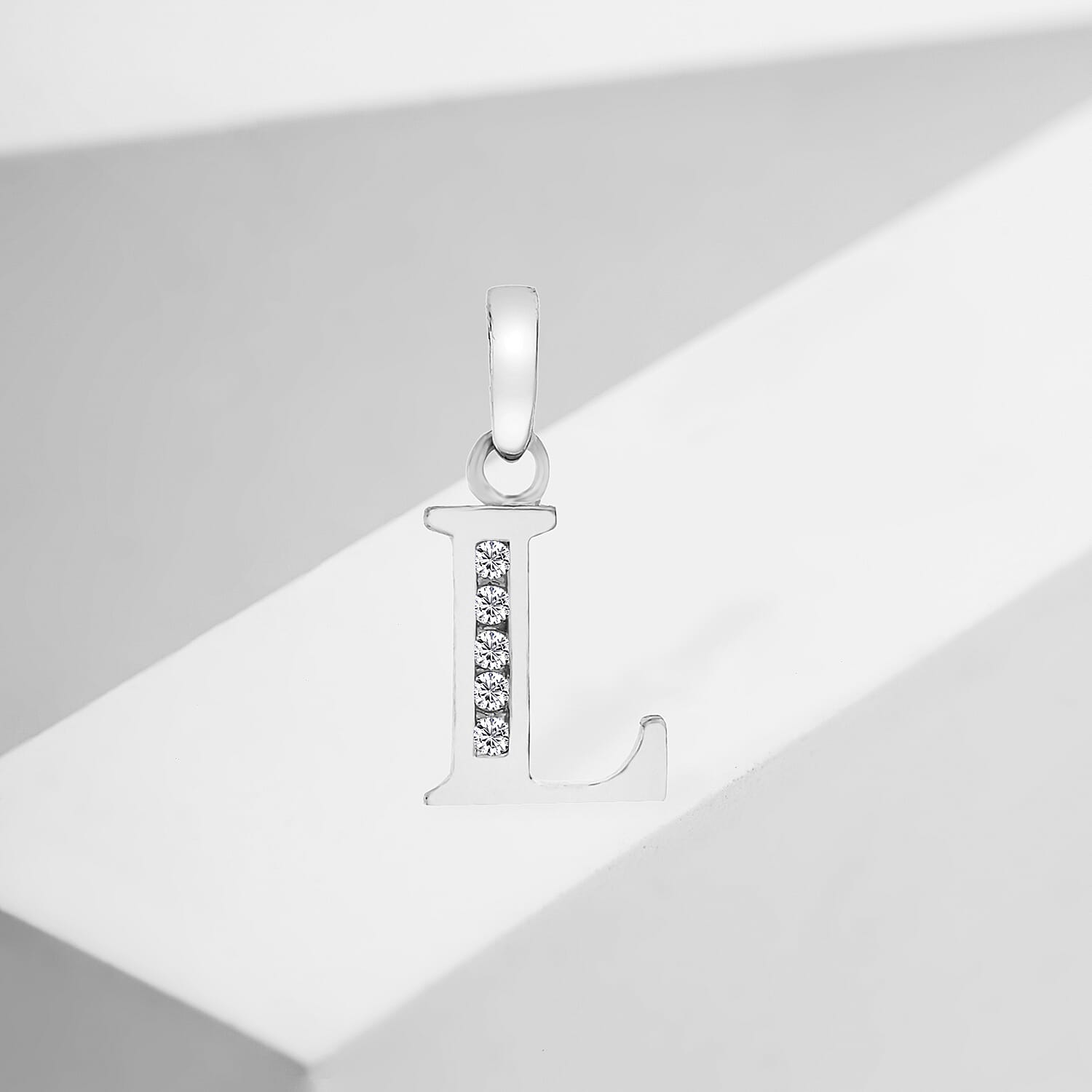 9K White Gold  A   Cubic Zirconia  Pendant 0.03 ct,  Gold Wt. 0.37 Gms  0.025  Ct.